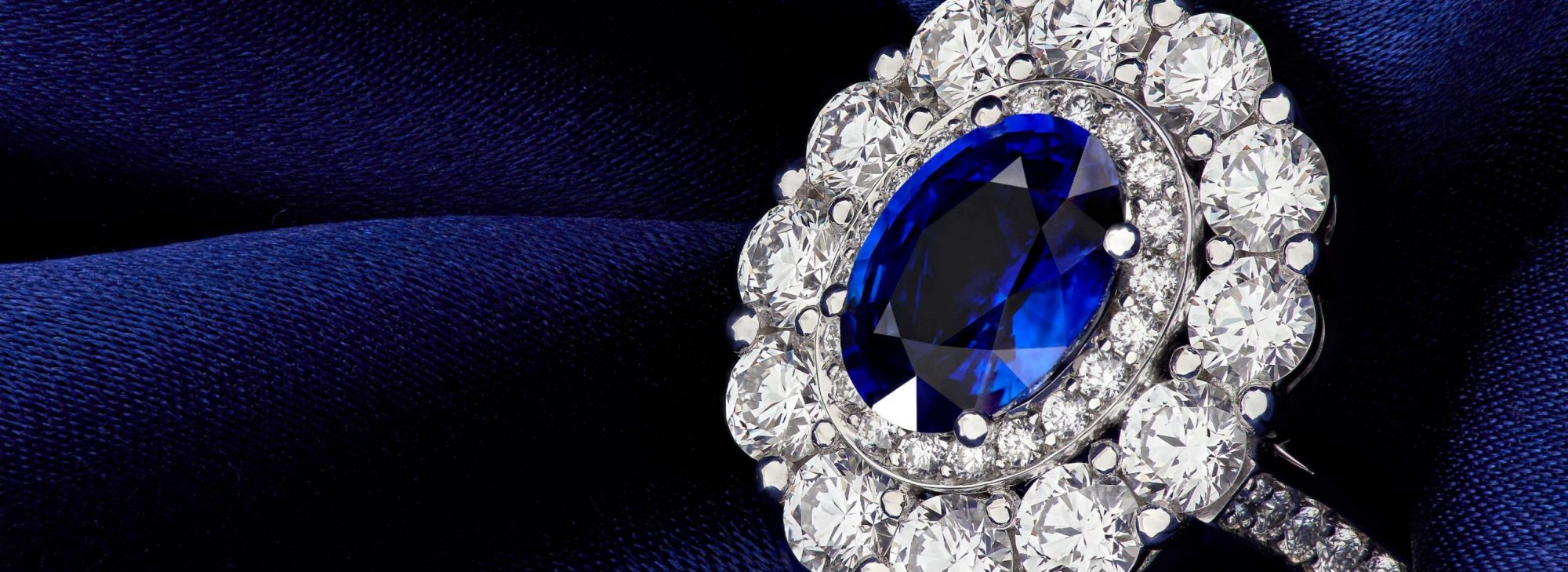 Close up of a Garrard 1735 Sapphire and diamond engagement ring from the bridal jewellery collection