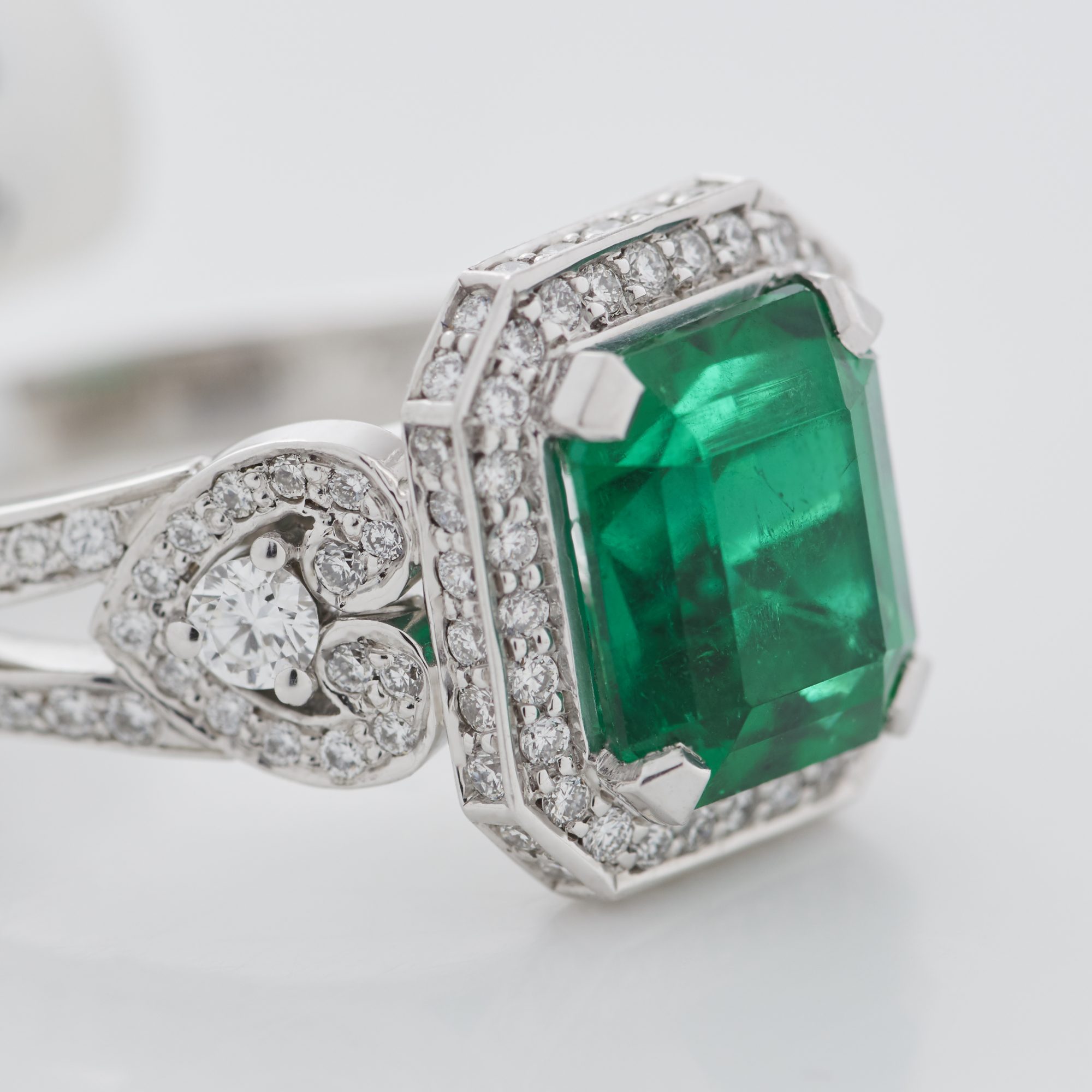 Close up of a Garrard emerald cut emerald and diamond ring 2