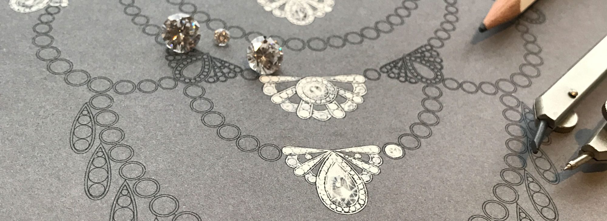 Close up of a gouache painting with losse diamonds and painting tools at Garrard design workship