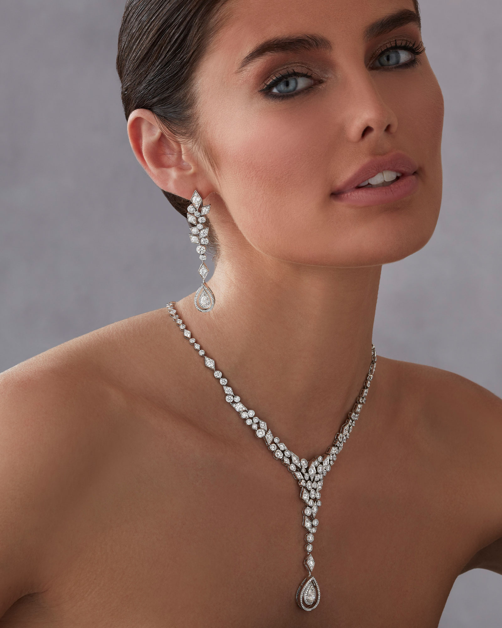 Model wears Garrard high jewellery collection Albemarle Abstract High Jewellery Suite 1