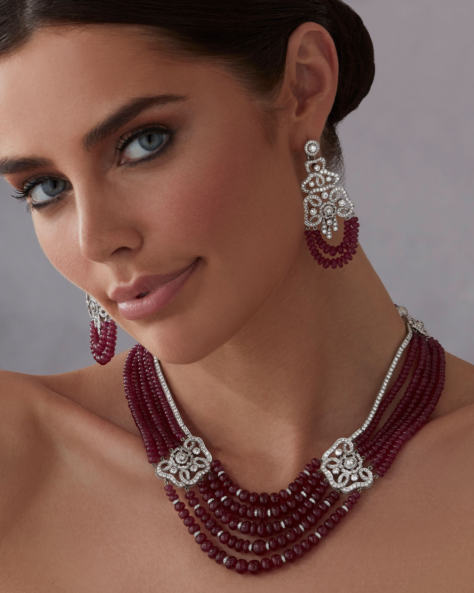 Model wears Garrard high jewellery collection Red Rose High Jewellery Suite 1