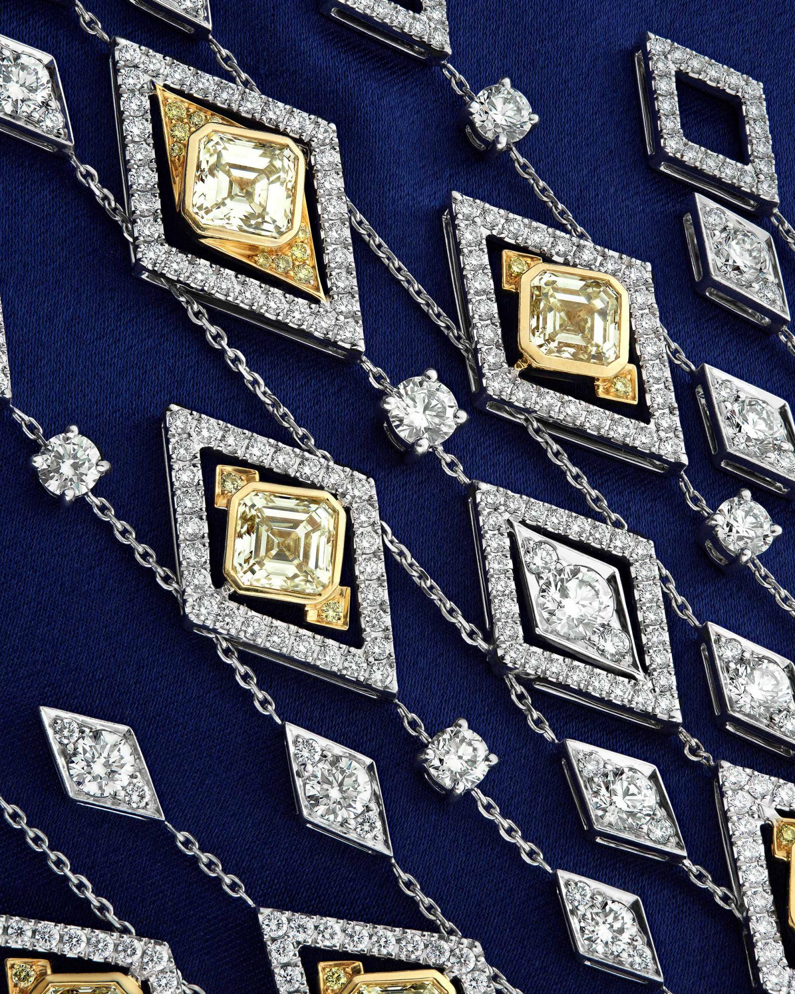 close up detail view of yellow and white diamonds set in the Garrard Cosmos High Jewellery necklace
