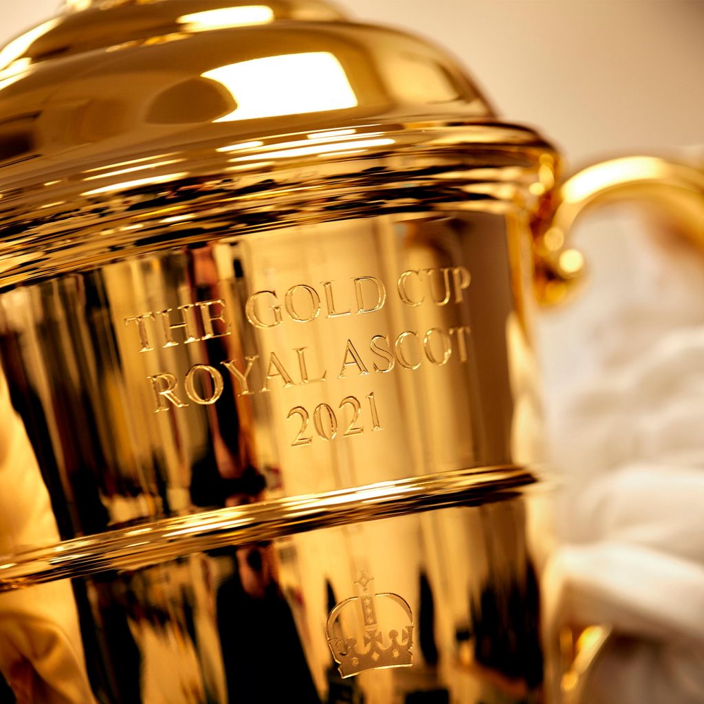 The 2021 Ascot Gold Cup Trorphy crafted by Garrard being lifted
