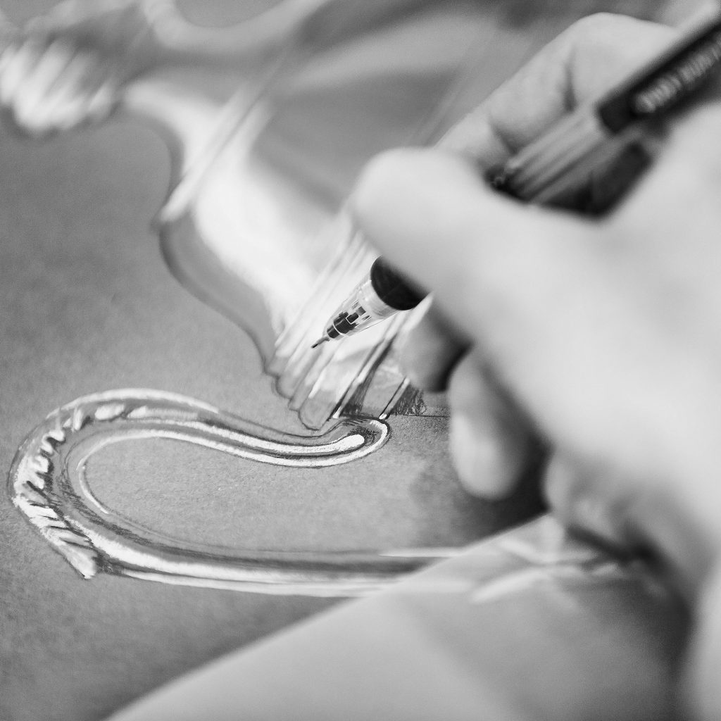 A Garrard Trophy handle design being sketched in paint