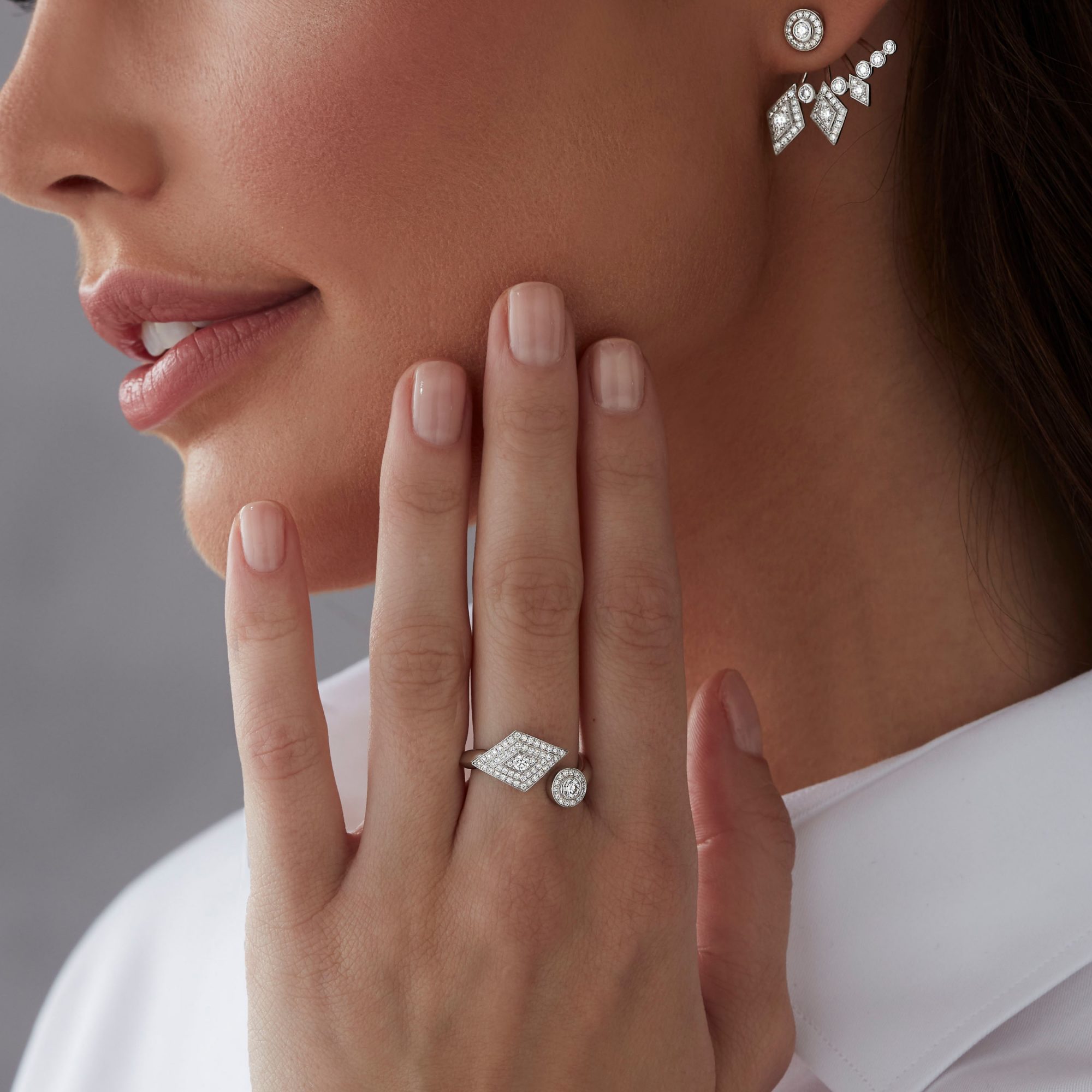 Garrard Albemarle jewellery Collection Wraparound Diamond Ring in 18ct White Gold 2014368 and earrings On model 1