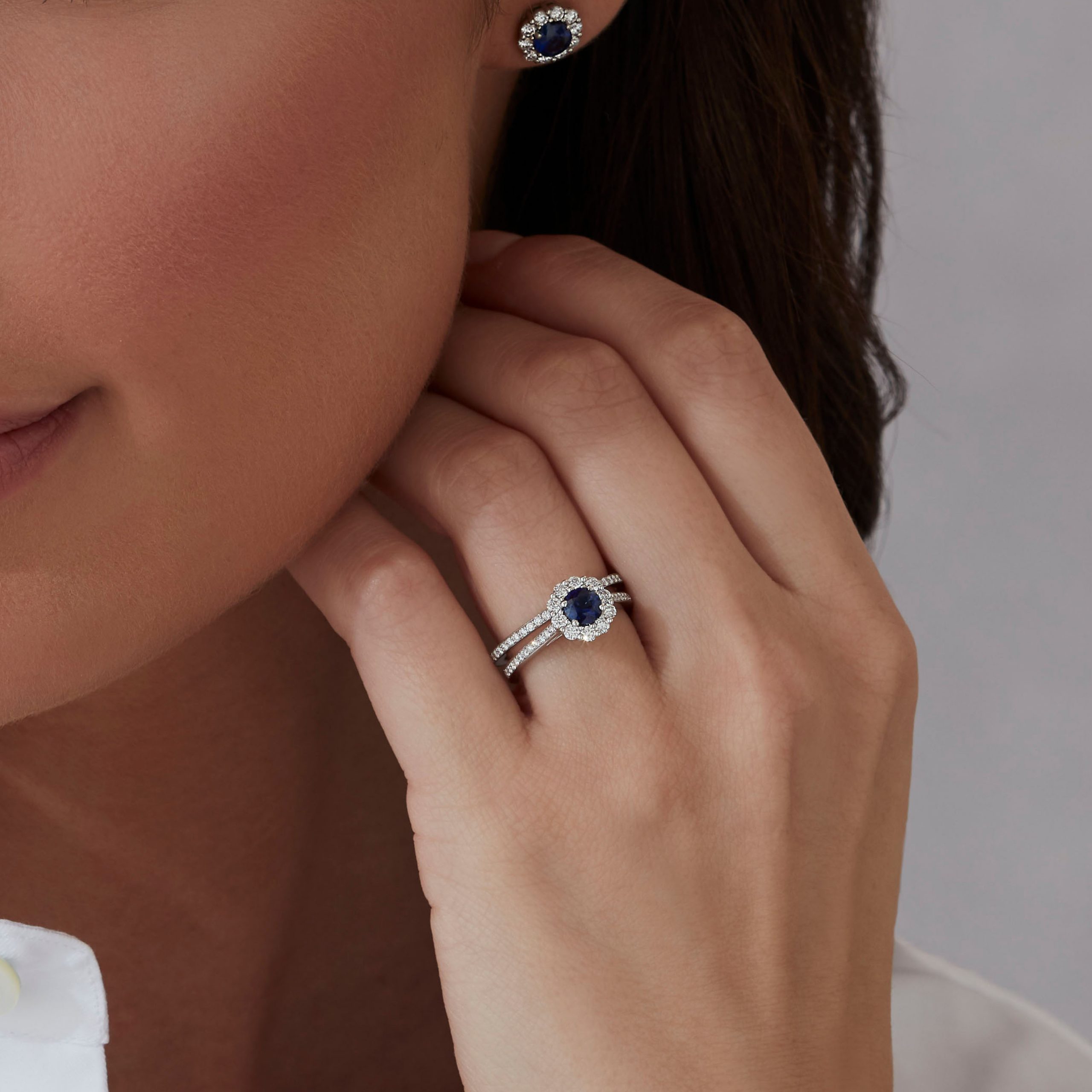Garrard Bridal jewellery collection 1735 Diamond Eternity Band in Platinum1.5mm 2015351 and sapphire enagement ring On model Garrard Bridal jewellery collection 1735 Diamond Eternity Band in Platinum1.5mm 2015351 and sapphire enagement ring On model