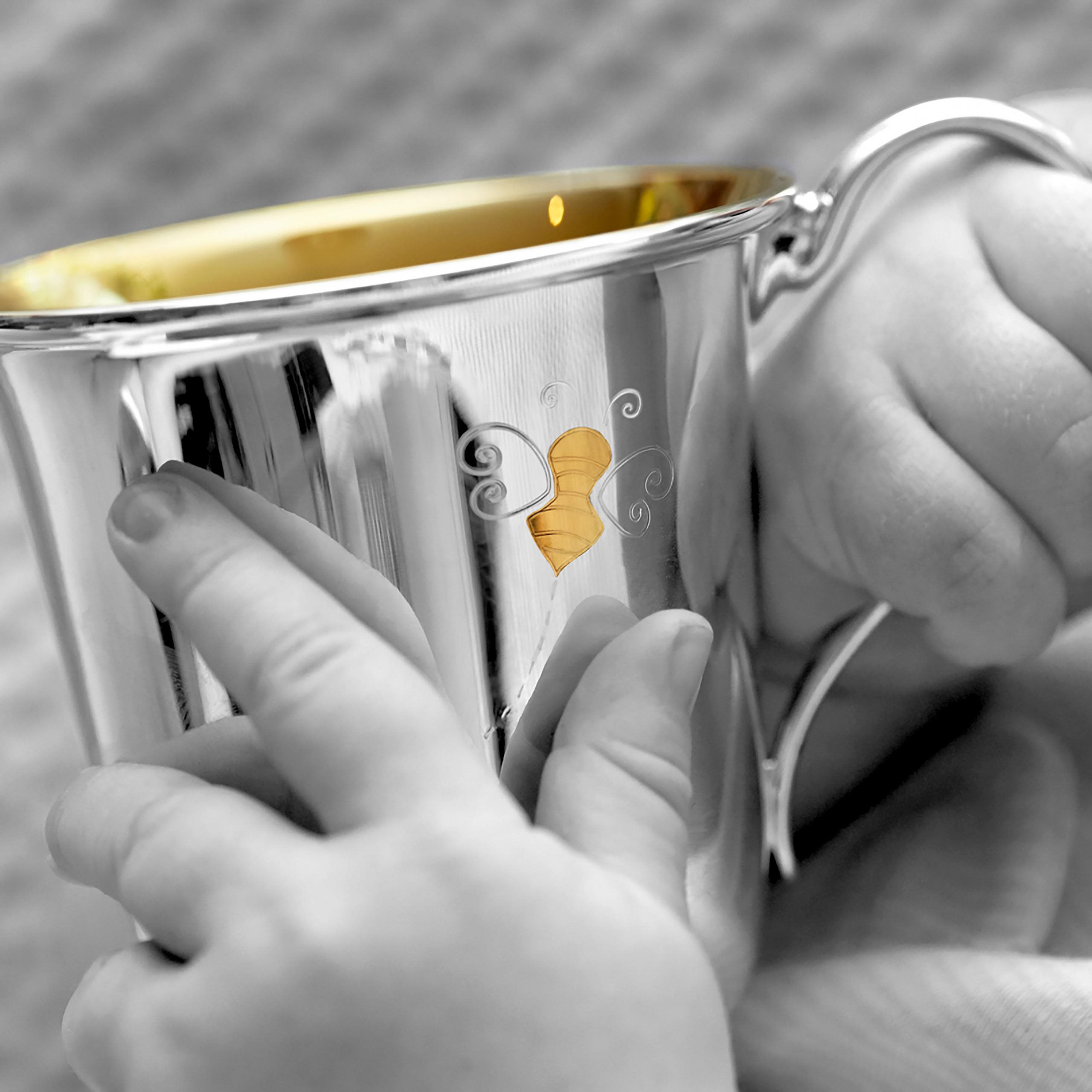 Garrard Christening New Baby Gift Baby Bee collection Sterling Silver Cup 2017564 held by a Baby Garrard Christening New Baby Gift Baby Bee collection Sterling Silver Cup 2017564 held by a Baby