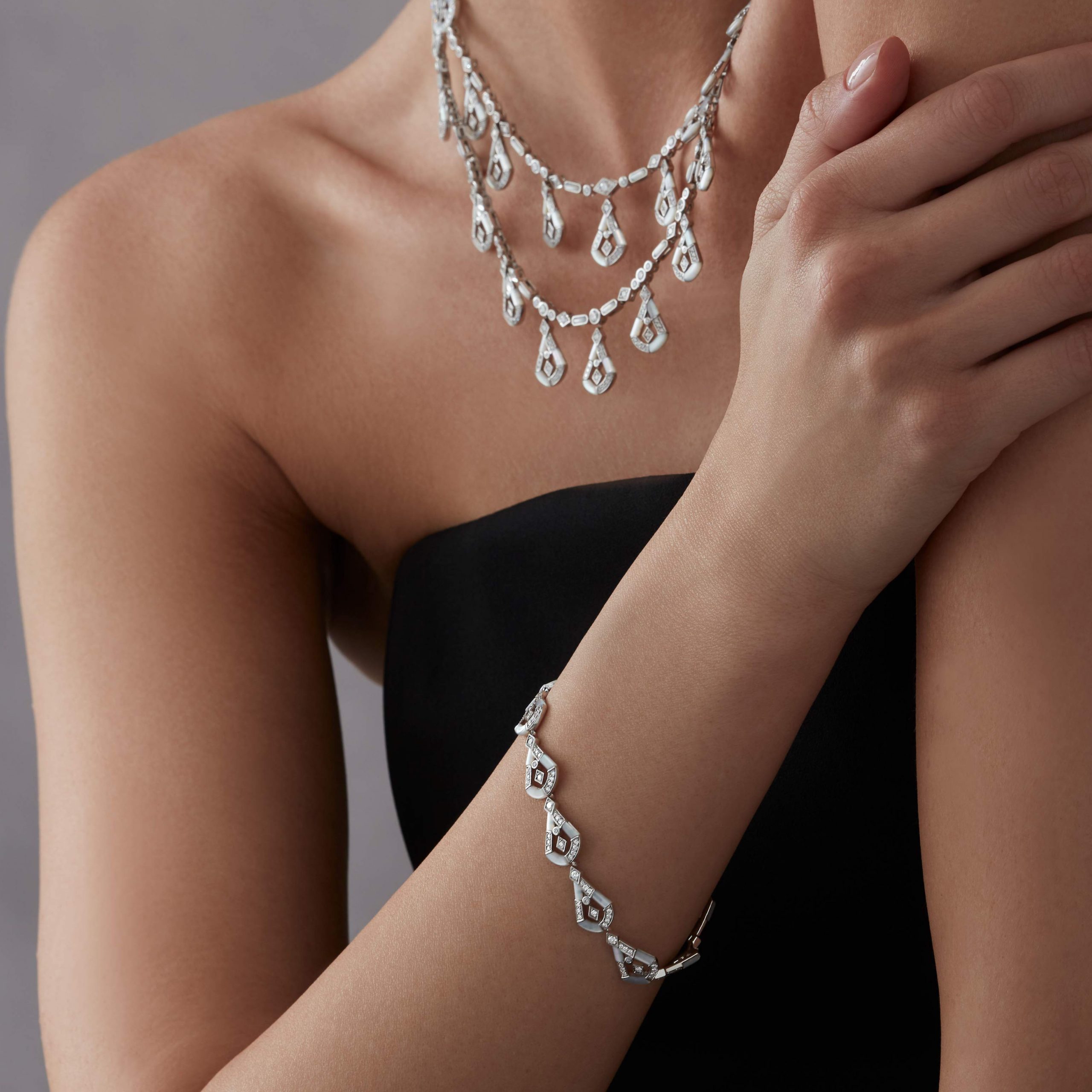Garrard Fanfare Symphony High Jewellery Diamond and Mother of Pearl Bracelet In 18ct White Gold 2017290 and necklace on model Garrard Fanfare Symphony High Jewellery Diamond and Mother of Pearl Bracelet In 18ct White Gold 2017290 and necklace on model