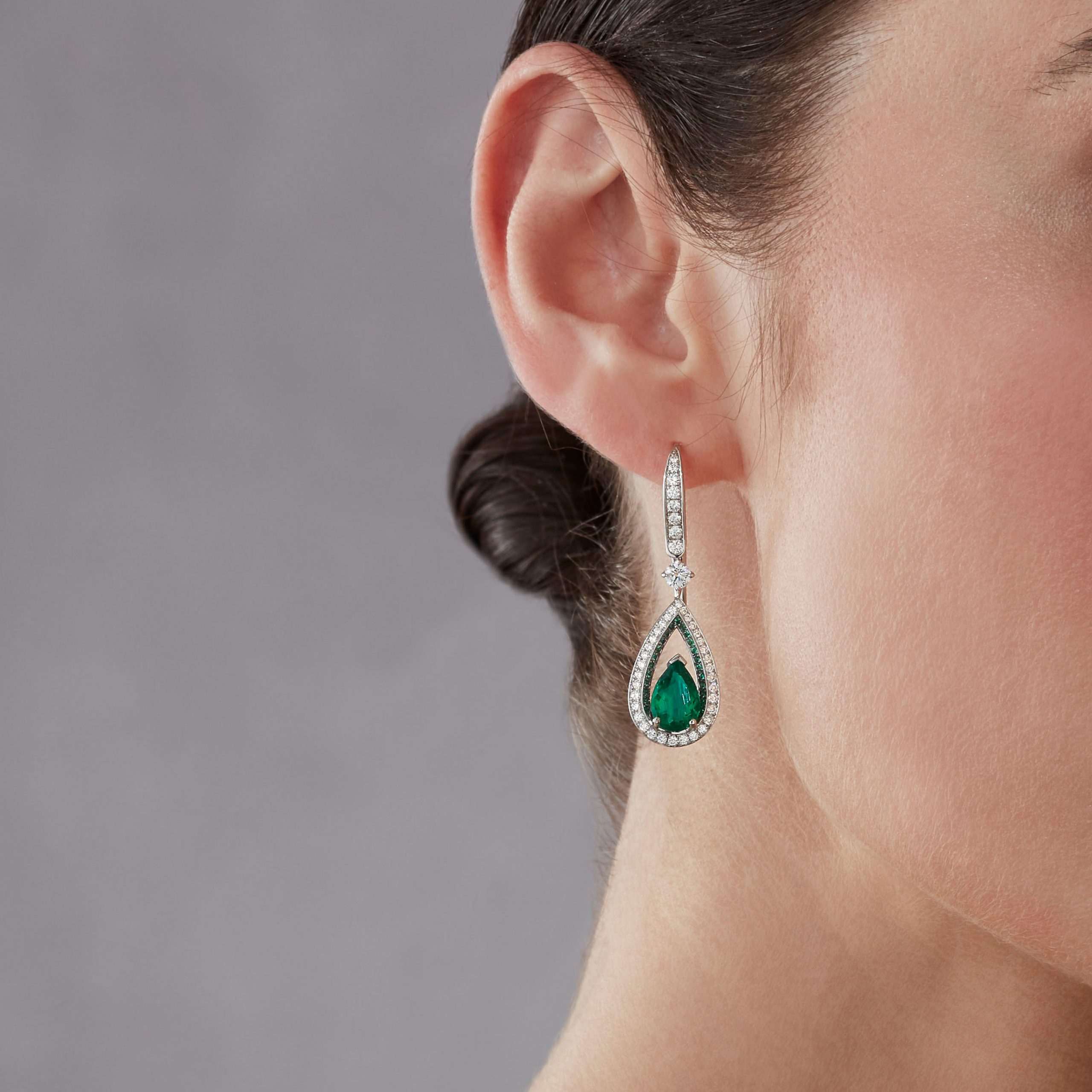 Garrard Jewelled Vault Emerald and Diamond High Jewellery Drop Earrings In 18 Carat White Gold 2017381 on model Garrard Jewelled Vault Emerald and Diamond High Jewellery Drop Earrings In 18 Carat White Gold 2017381 on model