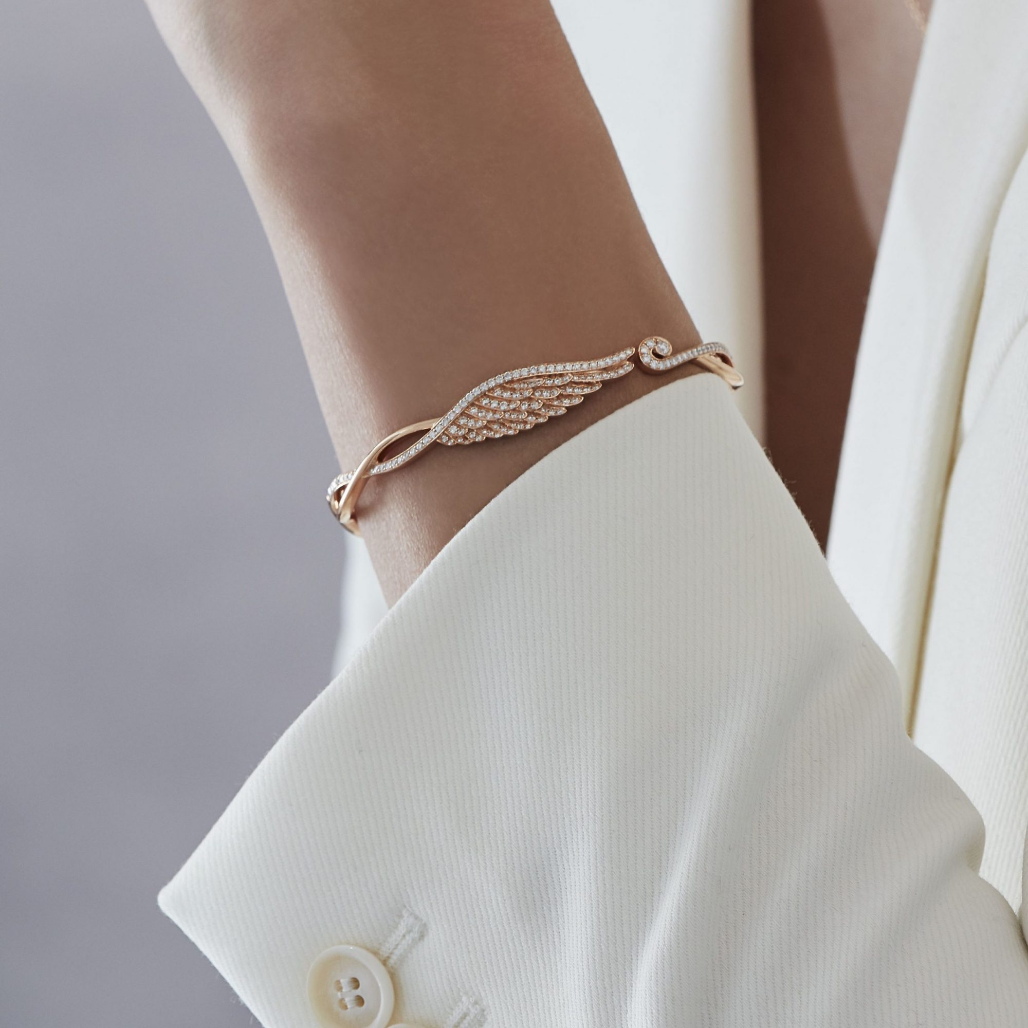 Garrard Wings Embrace jewellery collection Diamond Bracelet In 18ct Rose Gold 2015924 2015910 2015925 On Model
