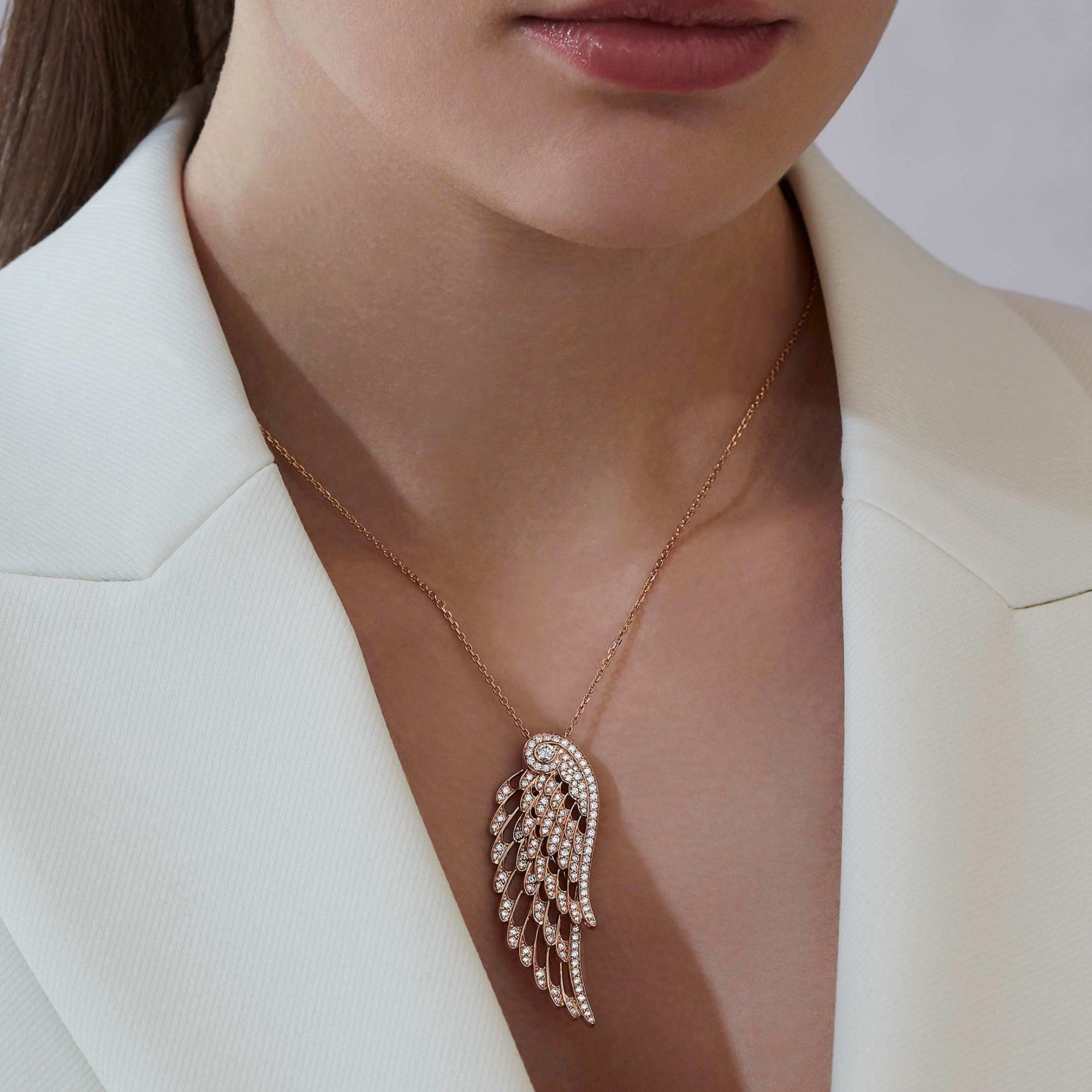 Garrard Wings Embrace jewellery collection Diamond Slider Pendant In 18ct Rose Gold 2015903 and earrings On Model 1