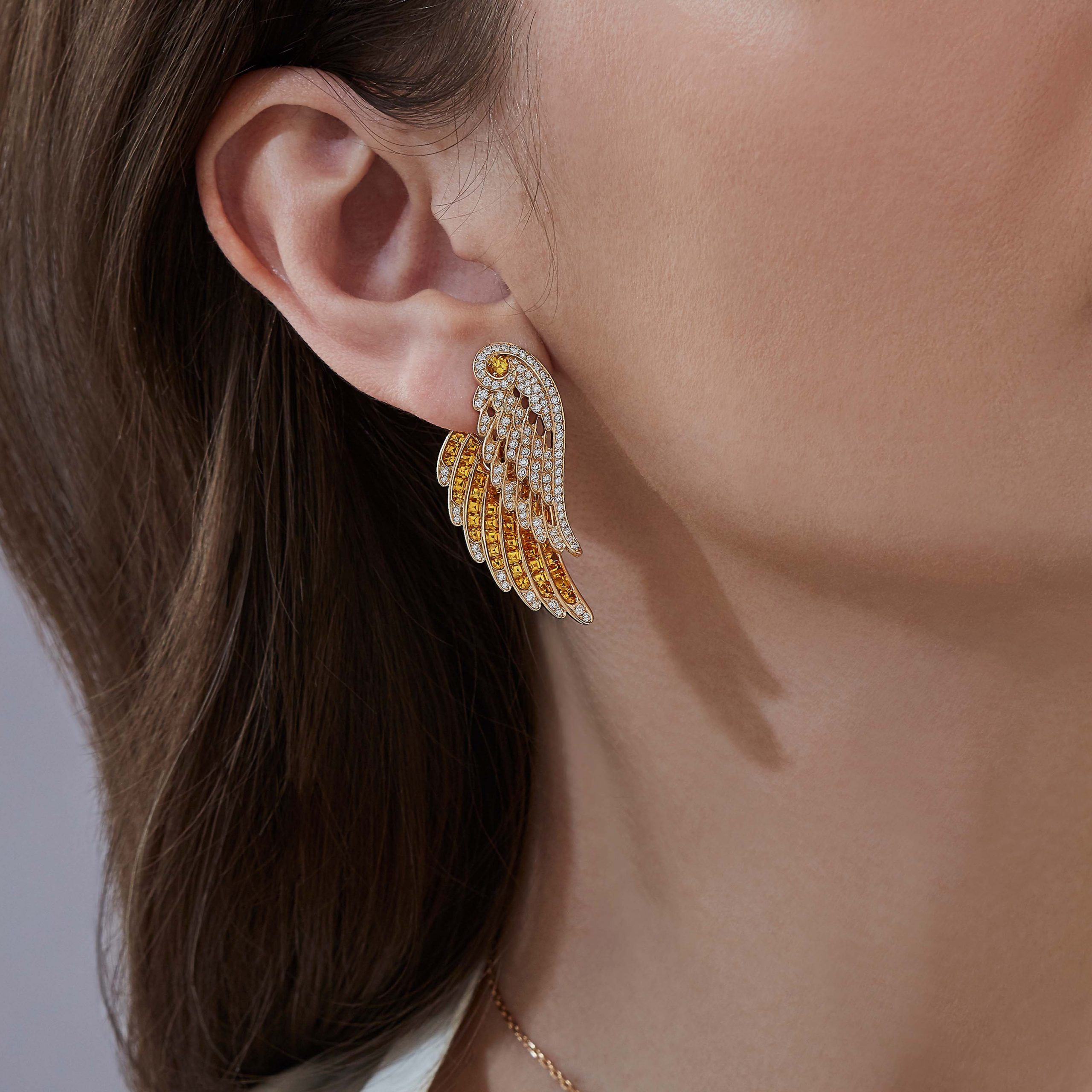 Garrard Wings Embrace jewellery collection Yellow Sapphire and Diamond Ear Climbers In 18ct Yellow Gold 2016645 On Model Garrard Wings Embrace jewellery collection Yellow Sapphire and Diamond Ear Climbers In 18ct Yellow Gold 2016645 On Model