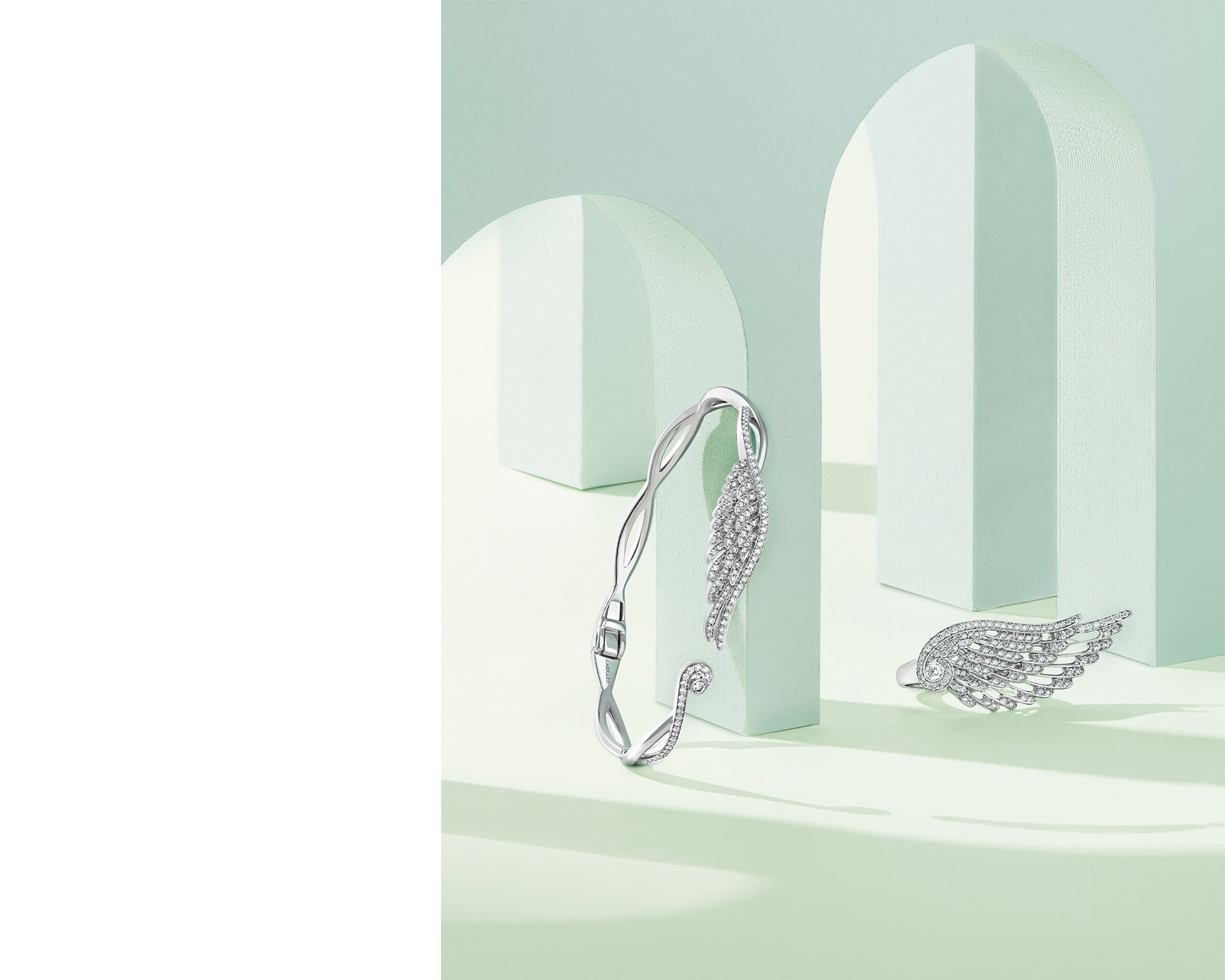 Garrard Wings Embrace jewellery collections diamond bangle and rings with paddings L