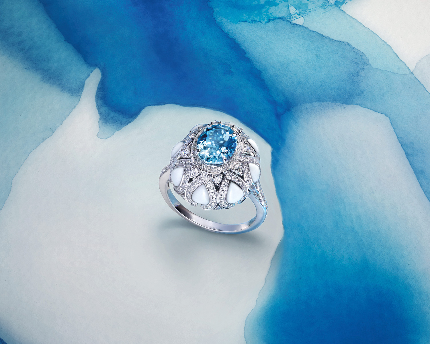 Close up of a Aloria Aquamarine Cocktail Ring In 18ct White Gold with Diamonds and Cacholong Opal from Garrard