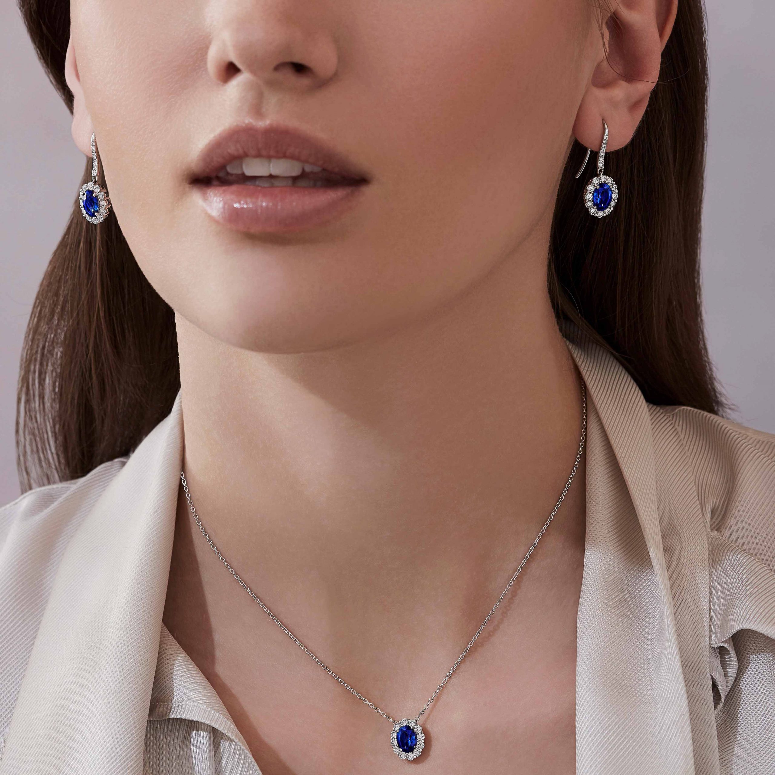 Garrard 1735 collection Sapphire Oval Drop Earrings in platinum with diamonds JE17PT11 and pendant On Model 1 Garrard 1735 collection Sapphire Oval Drop Earrings in platinum with diamonds JE17PT11 and pendant On Model 1