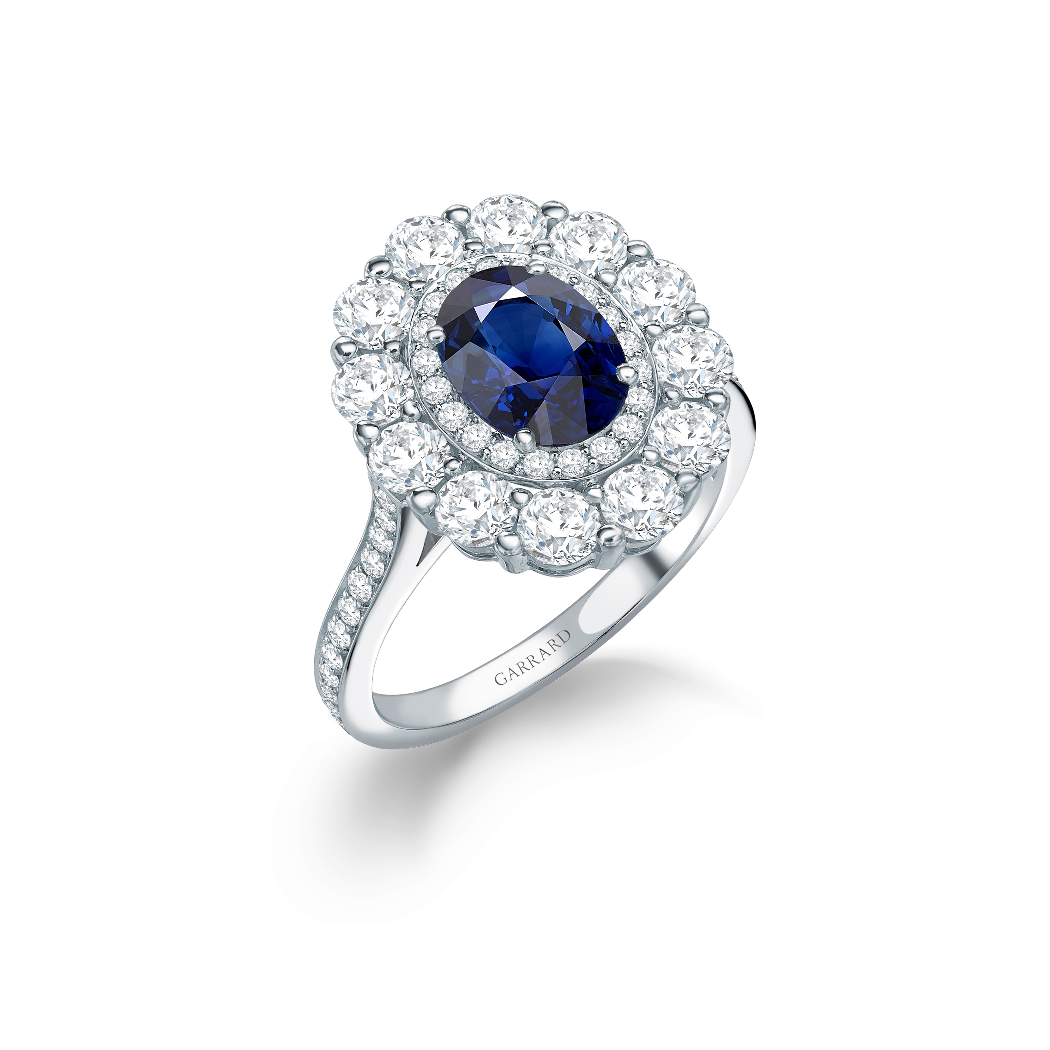 Garrard 1735 jewellery collection Sapphire Double Cluster Ring In Platinum with Diamonds JR17PT09 Hero View. Garrard 1735 jewellery collection Sapphire Double Cluster Ring In Platinum with Diamonds JR17PT09 Hero View.