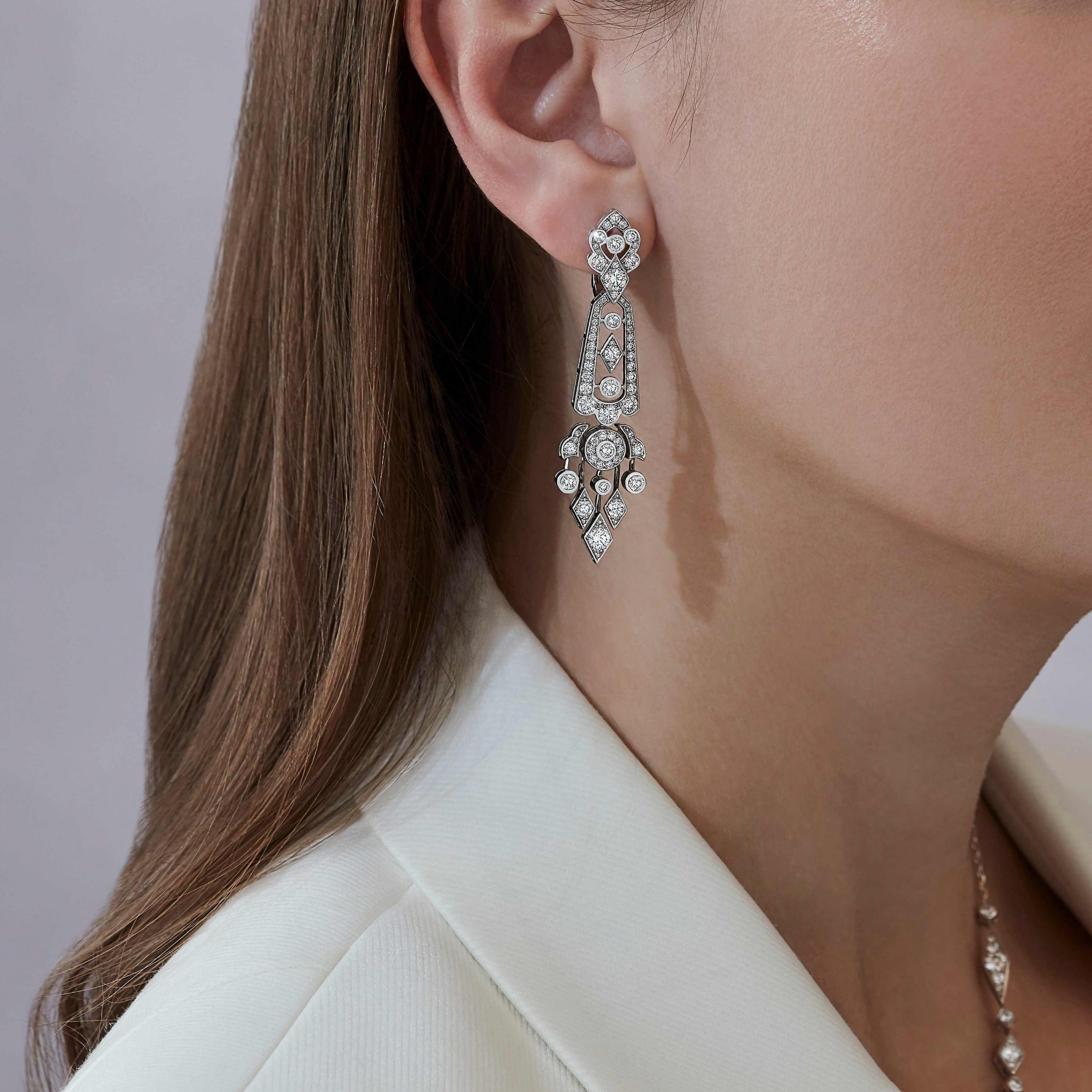 Garrard Albemarle jewellery collection Tiered Diamond Earrings In 18ct White Gold 2013244 On Model Garrard Albemarle jewellery collection Tiered Diamond Earrings In 18ct White Gold 2013244 On Model