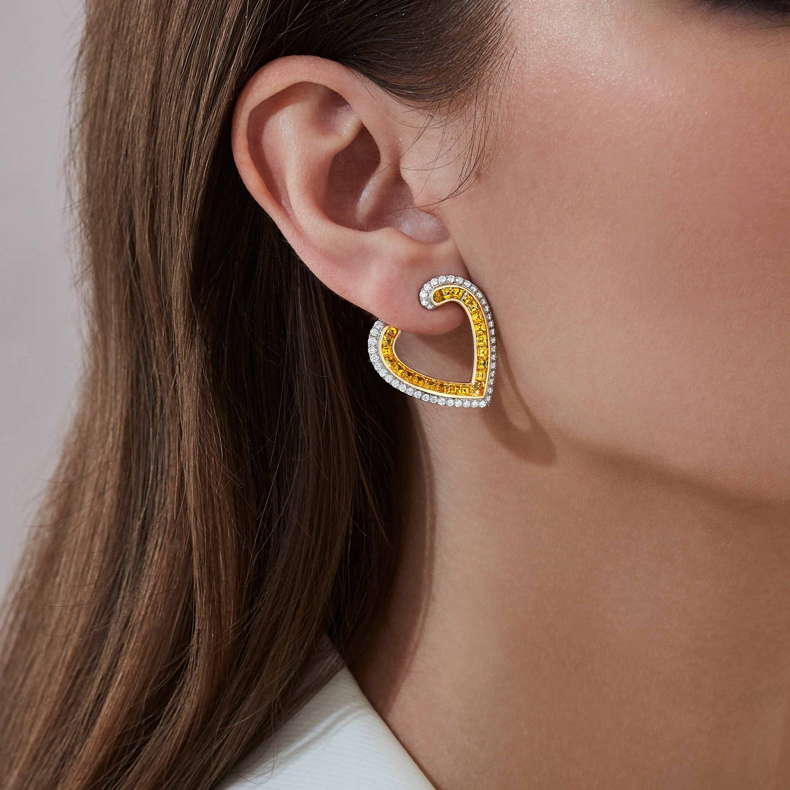 Garrard Aloria jewellery collection calibre cut yellow saphire earrings in 18ct white gold with diamonds 2016944 On Model Garrard Aloria jewellery collection calibre cut yellow saphire earrings in 18ct white gold with diamonds 2016944 On Model