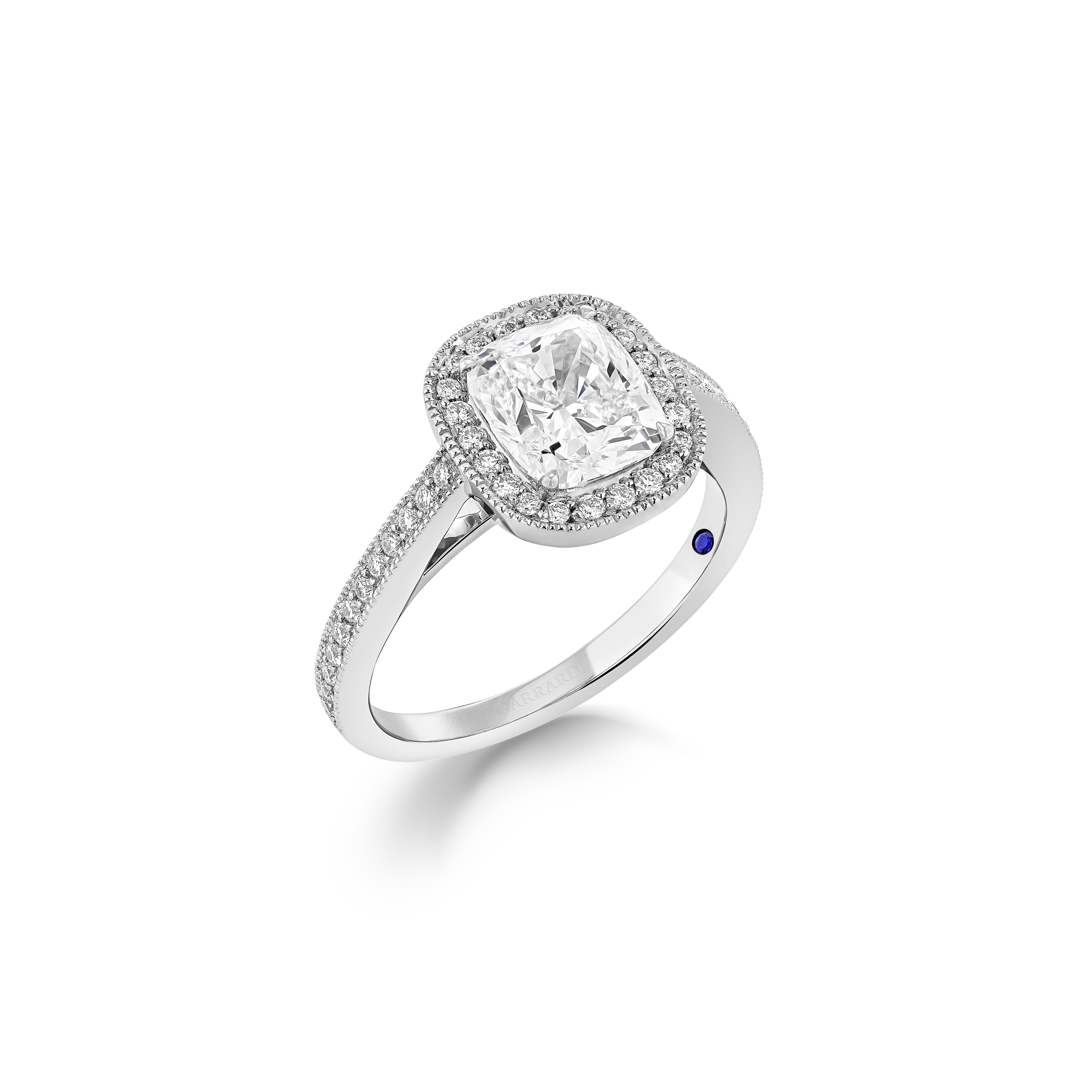 Garrard Bridal collection Evermore Cushion Cut Diamond Halo Engagement Ring In Platinum with Diamonds JREVPT01 2017569 Hero 1 Garrard Bridal collection Evermore Cushion Cut Diamond Halo Engagement Ring In Platinum with Diamonds JREVPT01 2017569 Hero 1