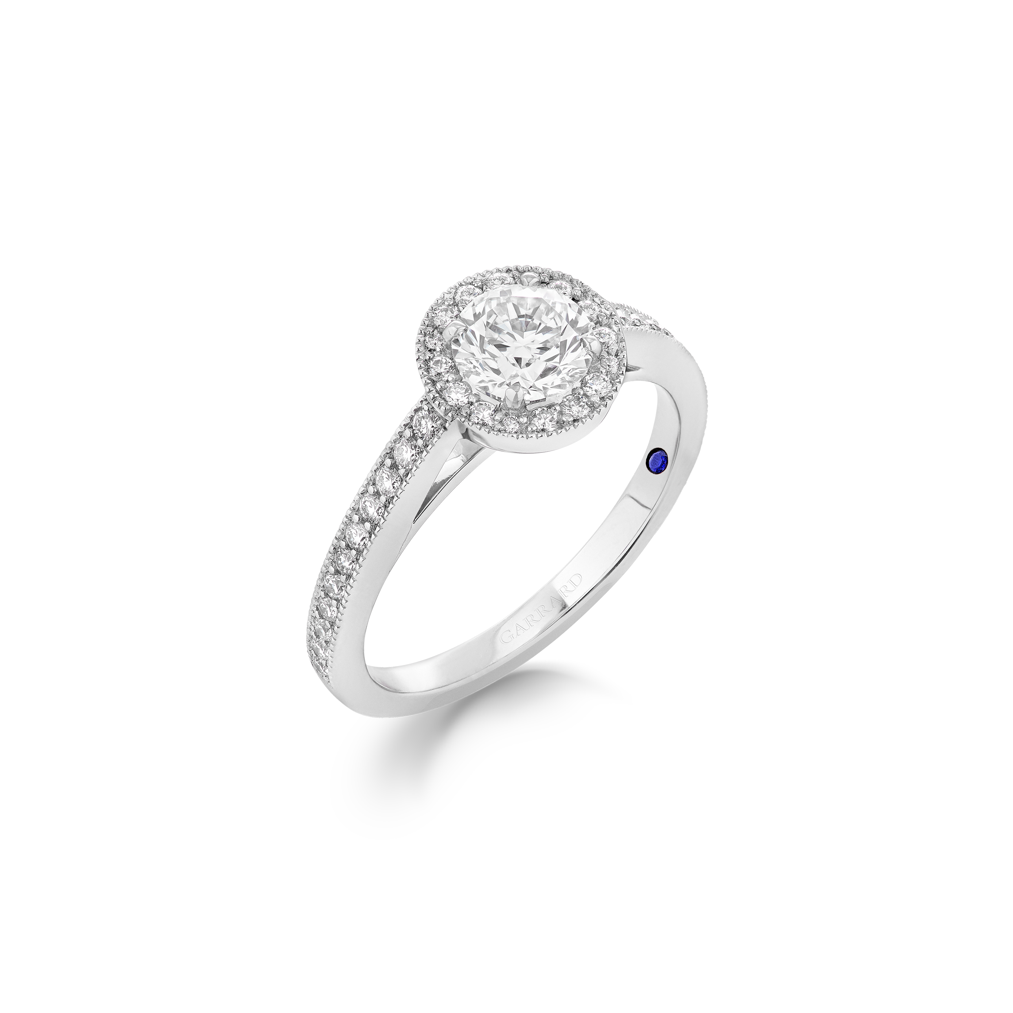 Garrard Bridal collection Evermore Round Diamond Halo Engagement Ring In Platinum with Diamonds JREVPT01 2017576 Hero 1 Garrard Bridal collection Evermore Round Diamond Halo Engagement Ring In Platinum with Diamonds JREVPT01 2017576 Hero 1