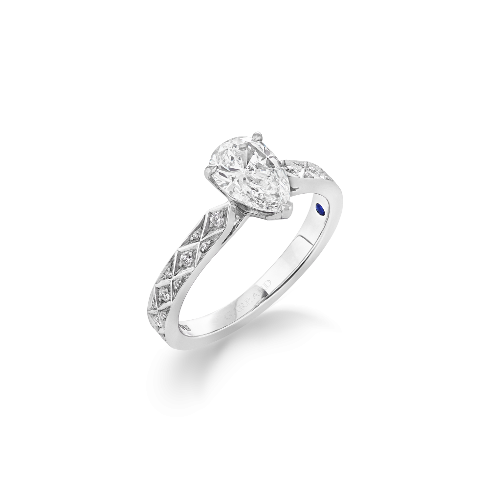 Garrard Bridal collection Signature Pear Shape Diamond Solitaire Engagement Ring In Platinum with Diamonds JRSGPT01 2017577 HERO 1