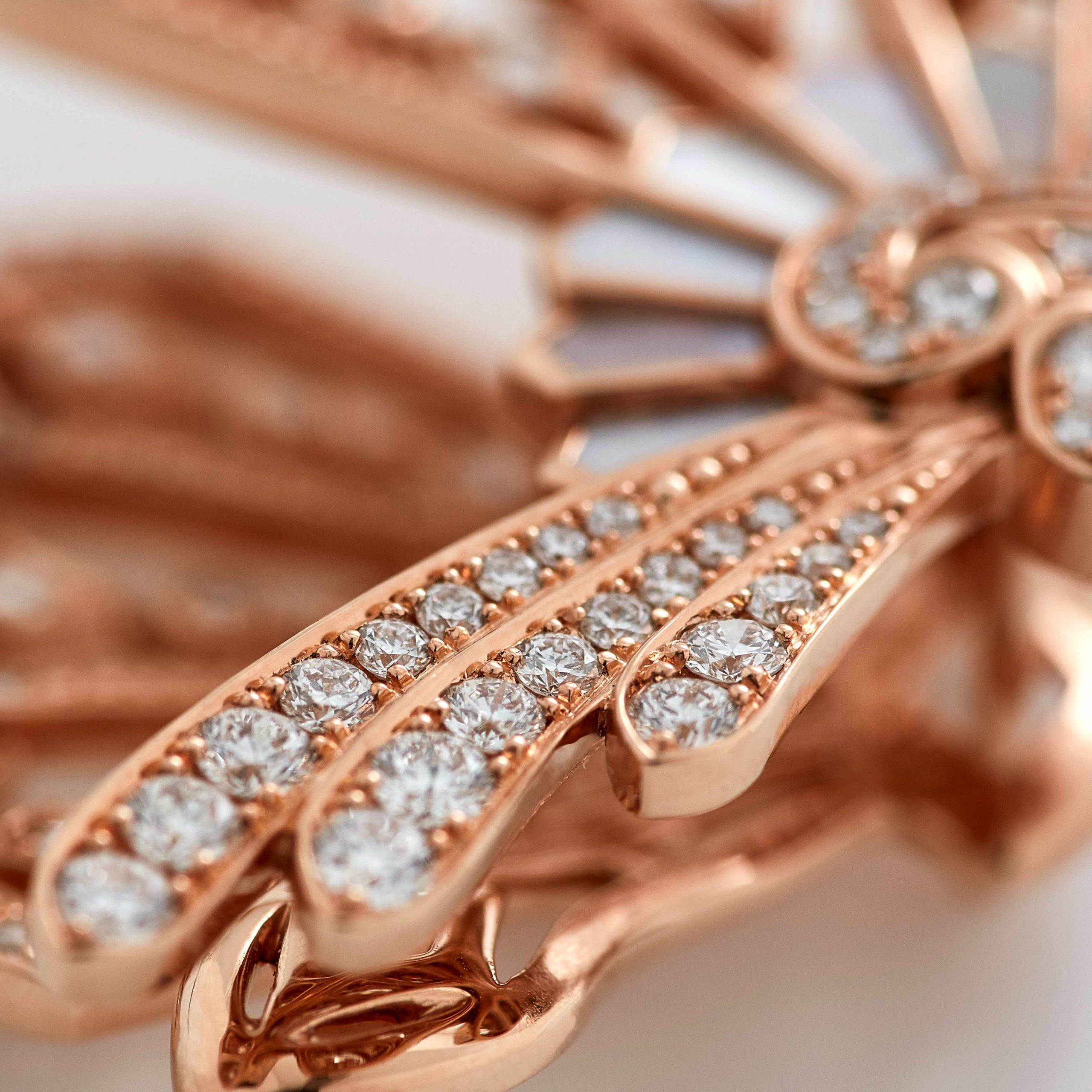 Garrard Fanfare Classic jewellery collection white diamond and mother of pearl ear climbers in 18ct rose gold 2015511 Detail View Garrard Fanfare Classic jewellery collection white diamond and mother of pearl ear climbers in 18ct rose gold 2015511 Detail View