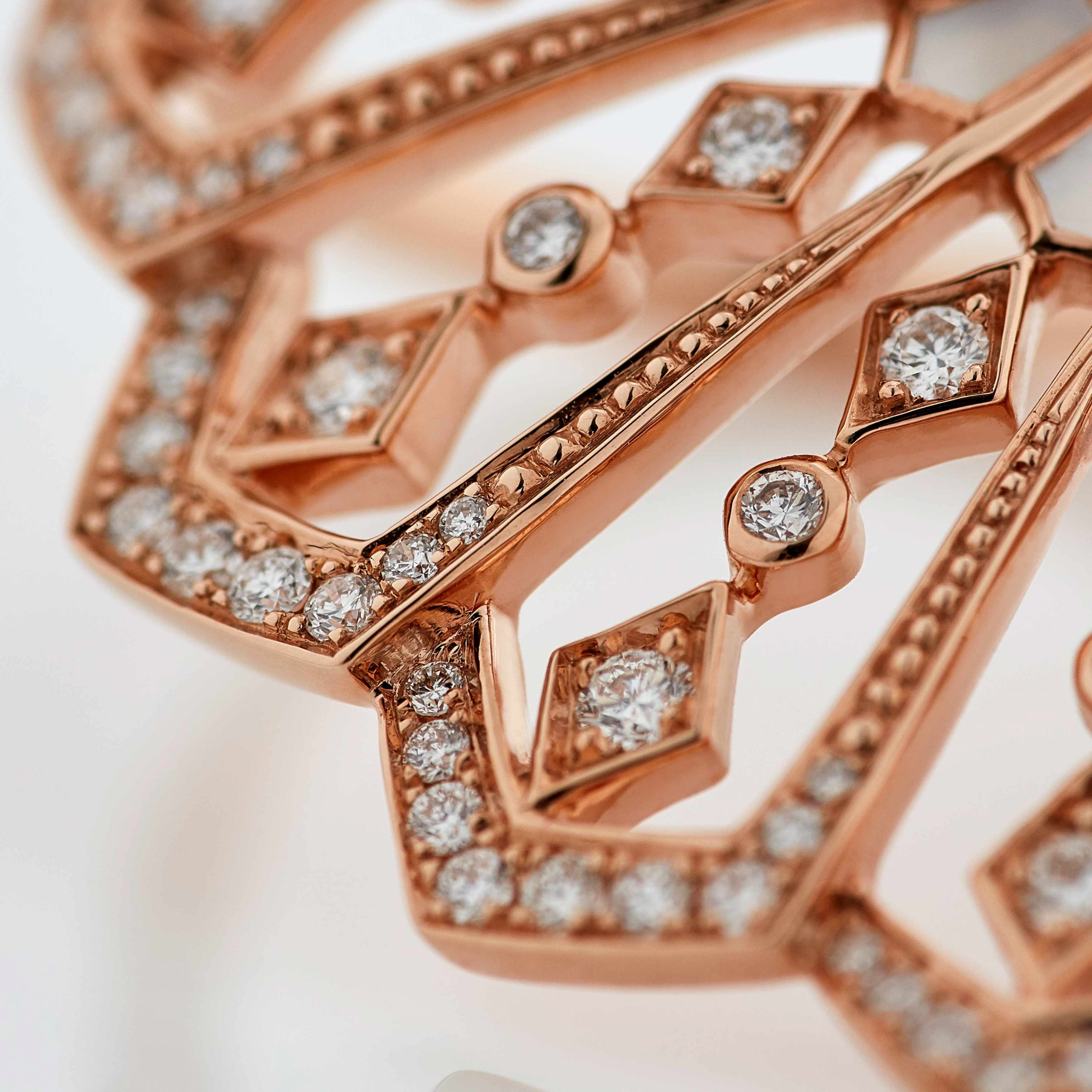Garrard Fanfare Classic jewellery collection white diamond and mother of pearl ring in 18ct rose gold 2015512 Detail View Garrard Fanfare Classic jewellery collection white diamond and mother of pearl ring in 18ct rose gold 2015512 Detail View