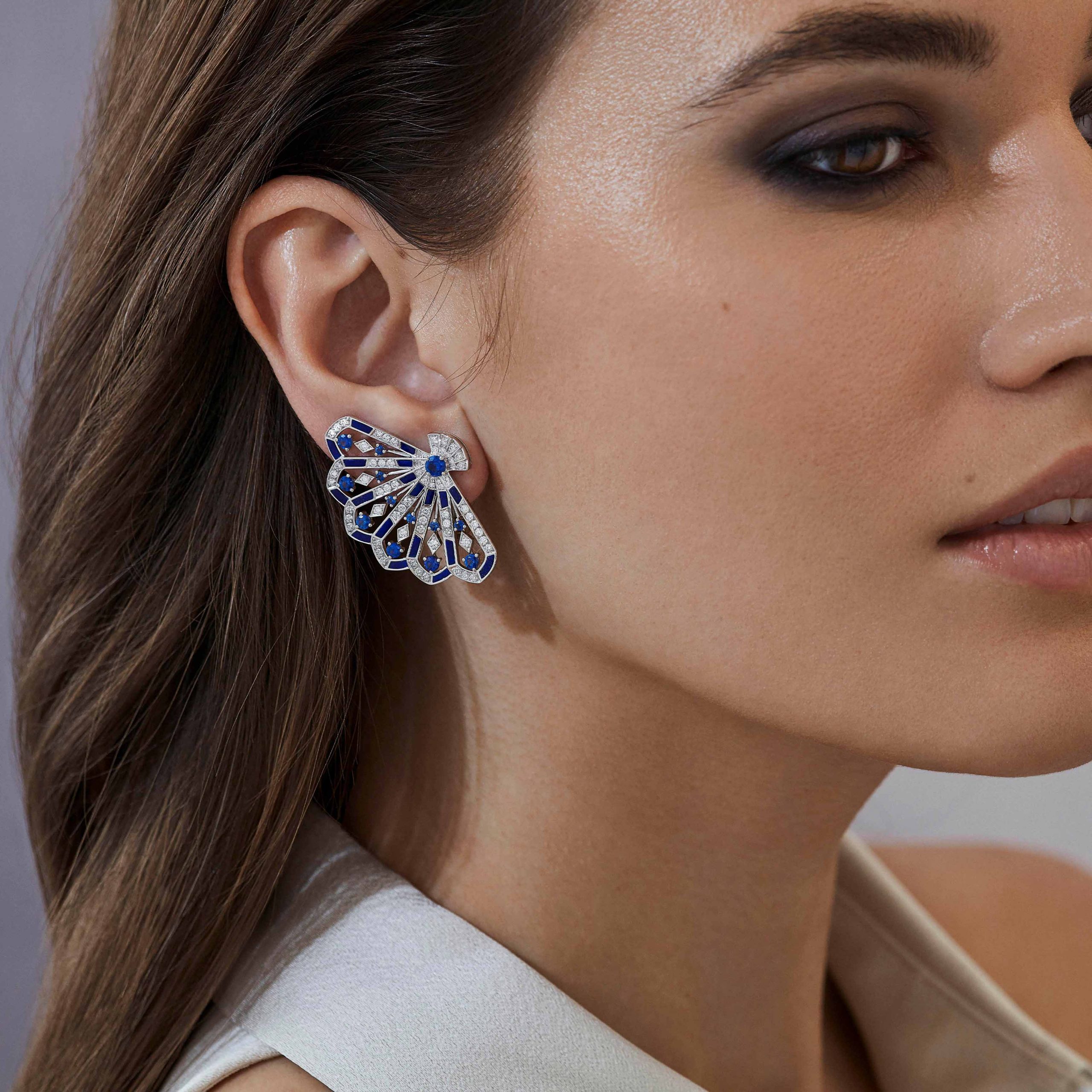 Garrard Fanfare Symphony jewellery Diamond and Sapphire Ear Climbers In 18ct White Gold with Lapis Lazuli 2017311 On Model Garrard Fanfare Symphony jewellery Diamond and Sapphire Ear Climbers In 18ct White Gold with Lapis Lazuli 2017311 On Model