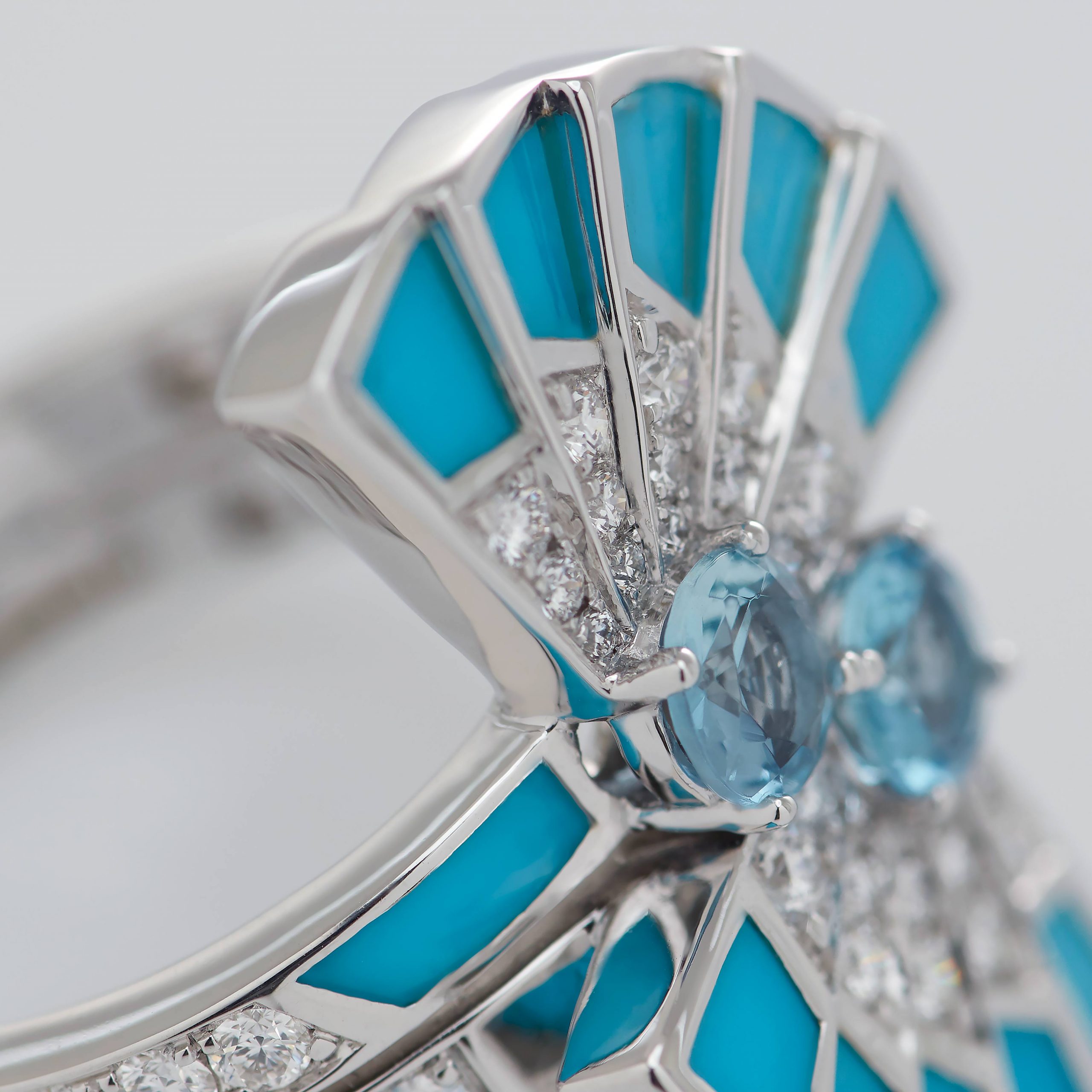 Garrard Fanfare Symphony jewellery collection Aquamarine and Turquoise full colour ring in 18ct white gold 2017307 Detail View Garrard Fanfare Symphony jewellery collection Aquamarine and Turquoise full colour ring in 18ct white gold 2017307 Detail View