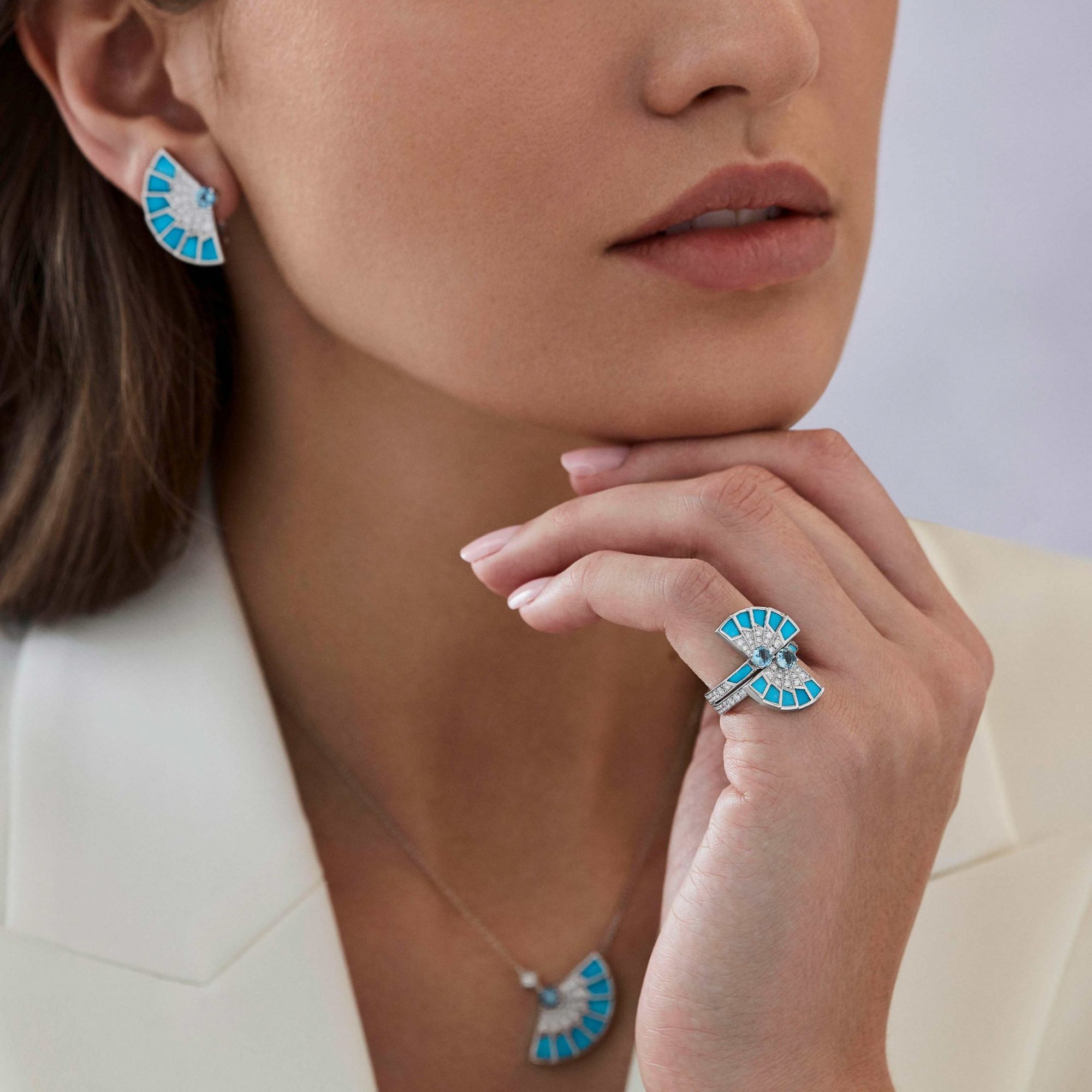 Garrard Fanfare Symphony jewellery collection Aquamarine and Turquoise full colour ring in 18ct white gold 2017307 On Model