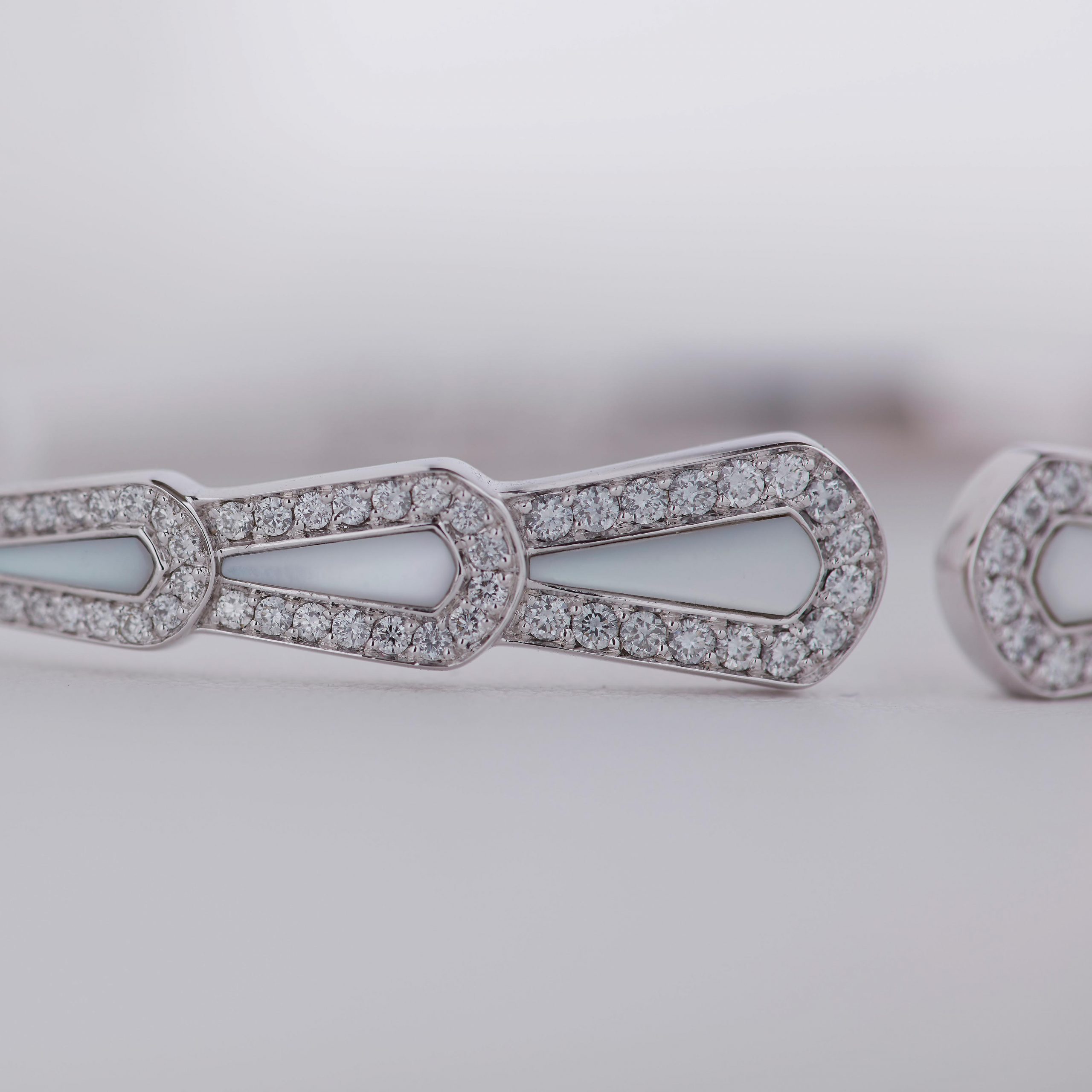 Garrard Fanfare Symphony jewellery collection Diamond and Mother of Pearl Bracelet In 18ct White Gold 2015949 2015853 2015950 Detail View Garrard Fanfare Symphony jewellery collection Diamond and Mother of Pearl Bracelet In 18ct White Gold 2015949 2015853 2015950 Detail View