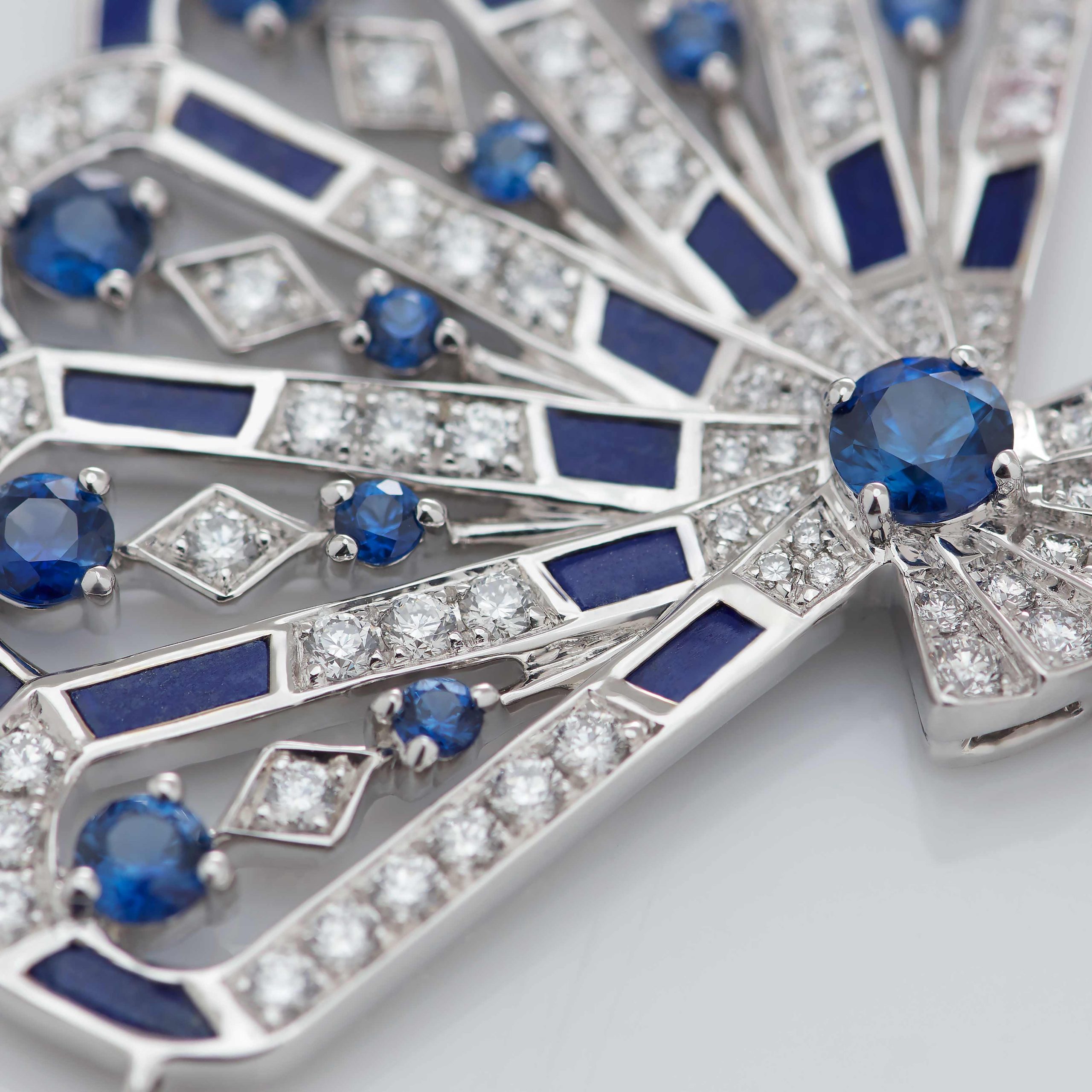 Garrard Fanfare Symphony jewellery collection Diamond and Sapphire Pendant with Lapis Lazuli 2017313 Detail View Garrard Fanfare Symphony jewellery collection Diamond and Sapphire Pendant with Lapis Lazuli 2017313 Detail View