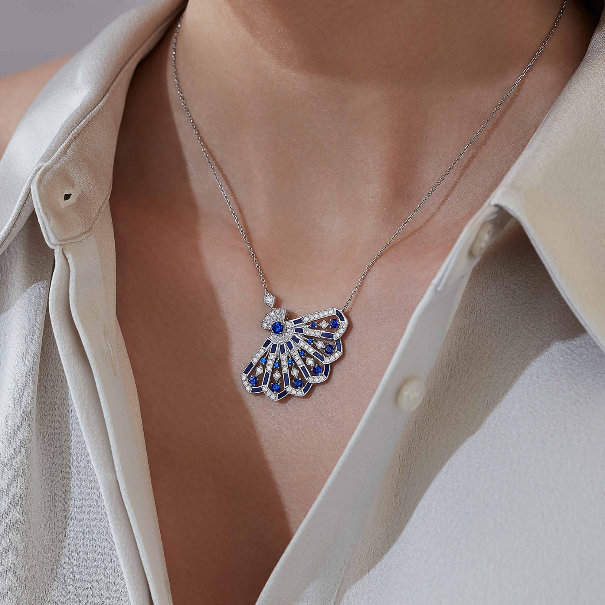 Garrard Fanfare Symphony jewellery collection Diamond and Sapphire Pendant with Lapis Lazuli 2017313 On Model
