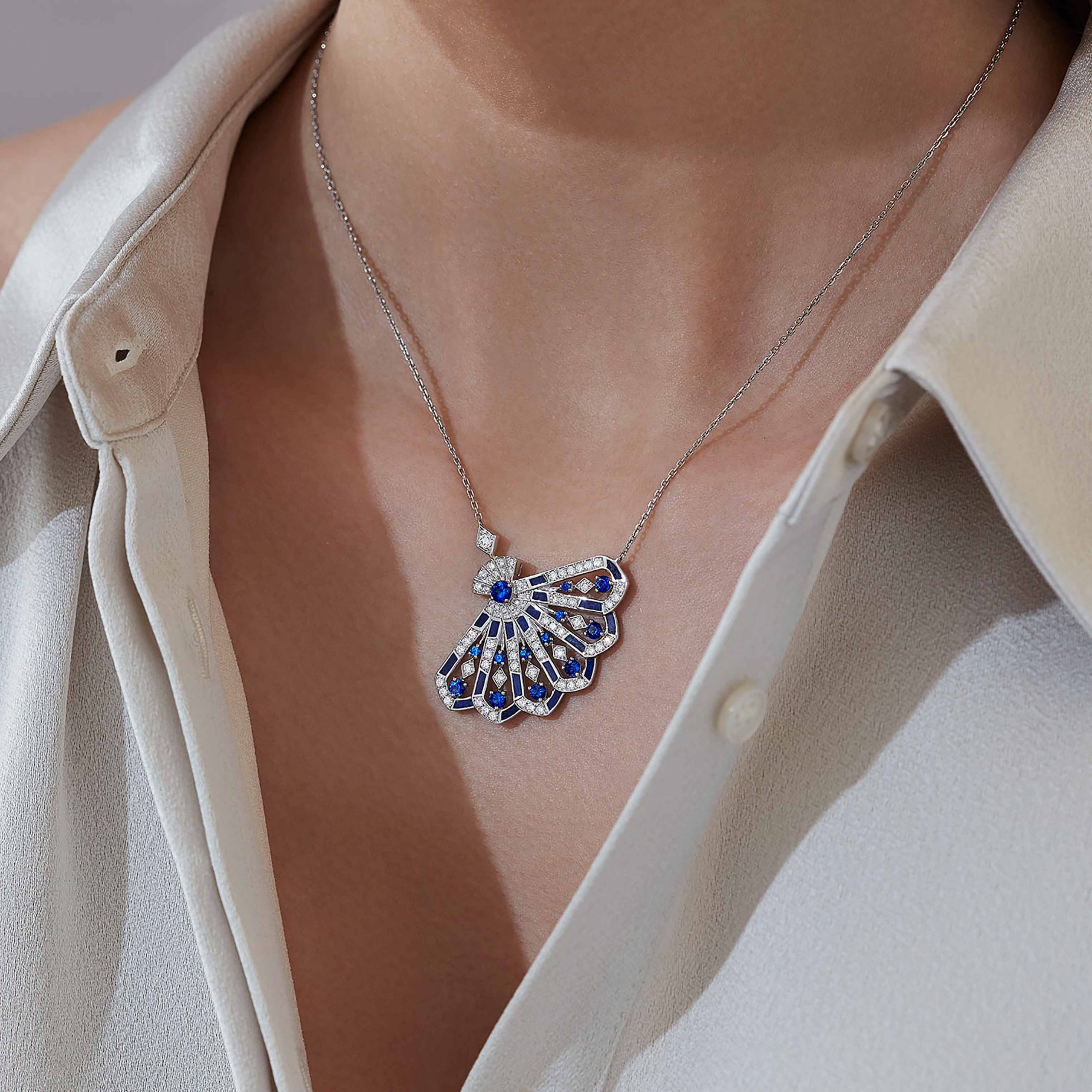 Garrard Fanfare Symphony jewellery collection Diamond and Sapphire Pendant with Lapis Lazuli 2017313 On Model Garrard Fanfare Symphony jewellery collection Diamond and Sapphire Pendant with Lapis Lazuli 2017313 On Model