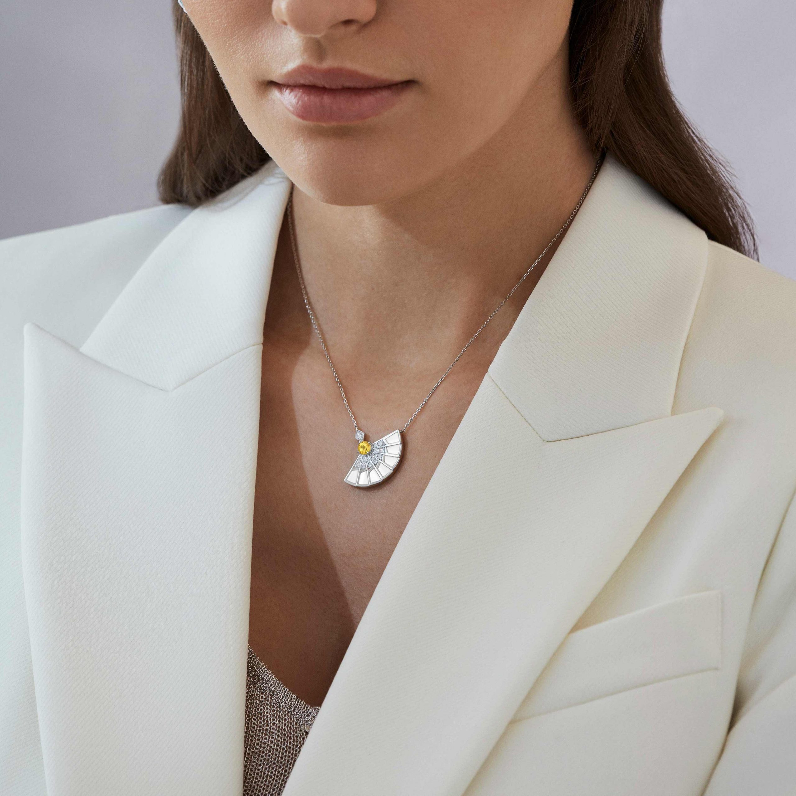 Garrard Fanfare Symphony jewellery collection Yellow Sapphire and White Agate Pendant in 18ct White Gold with Diamonds 2017337 On Model Garrard Fanfare Symphony jewellery collection Yellow Sapphire and White Agate Pendant in 18ct White Gold with Diamonds 2017337 On Model