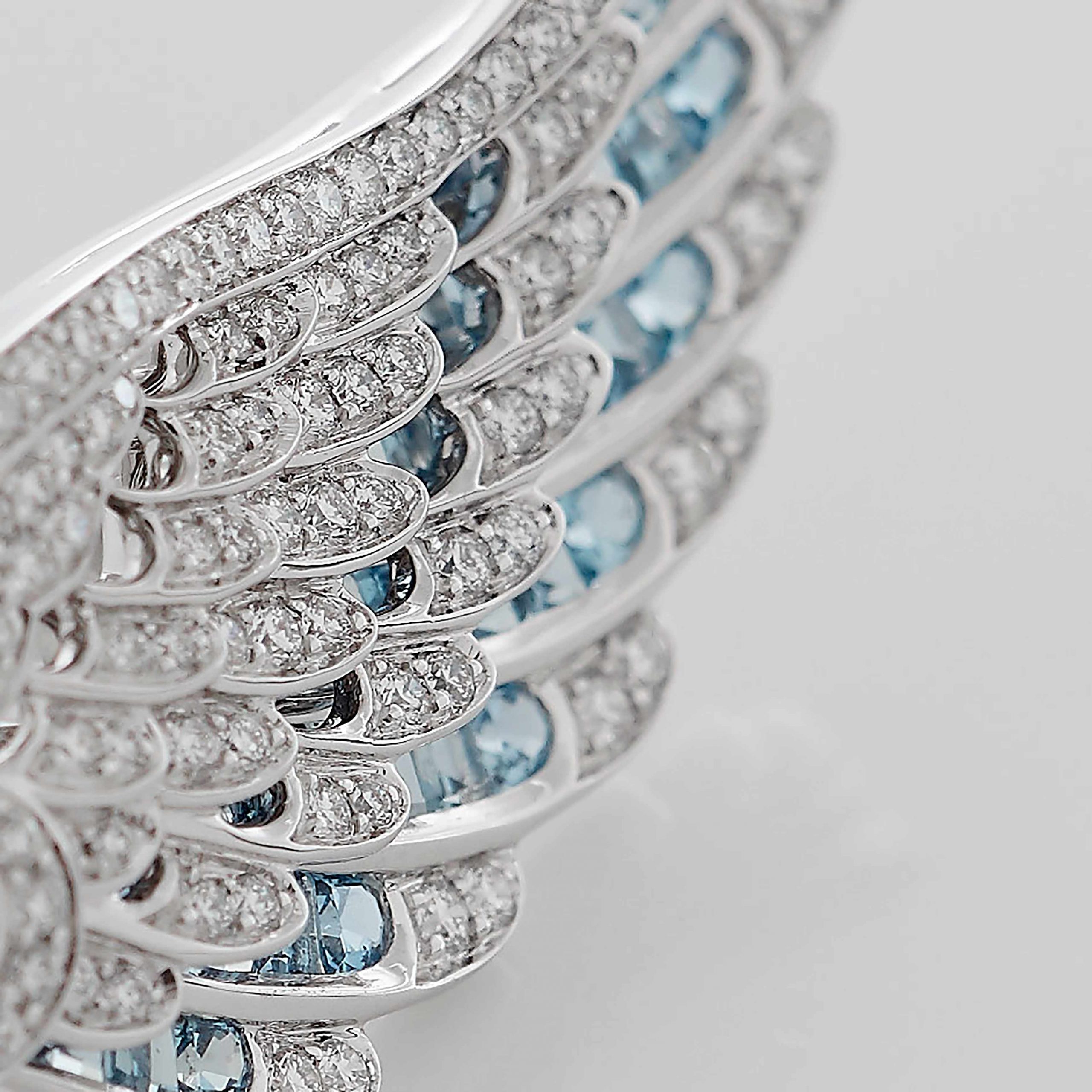 Garrard Wings Embrace jewellery collection Across the Finger Aquamarine and Diamond Ring In 18ct White Gold 2016579 Detail 3 Garrard Wings Embrace jewellery collection Across the Finger Aquamarine and Diamond Ring In 18ct White Gold 2016579 Detail 3