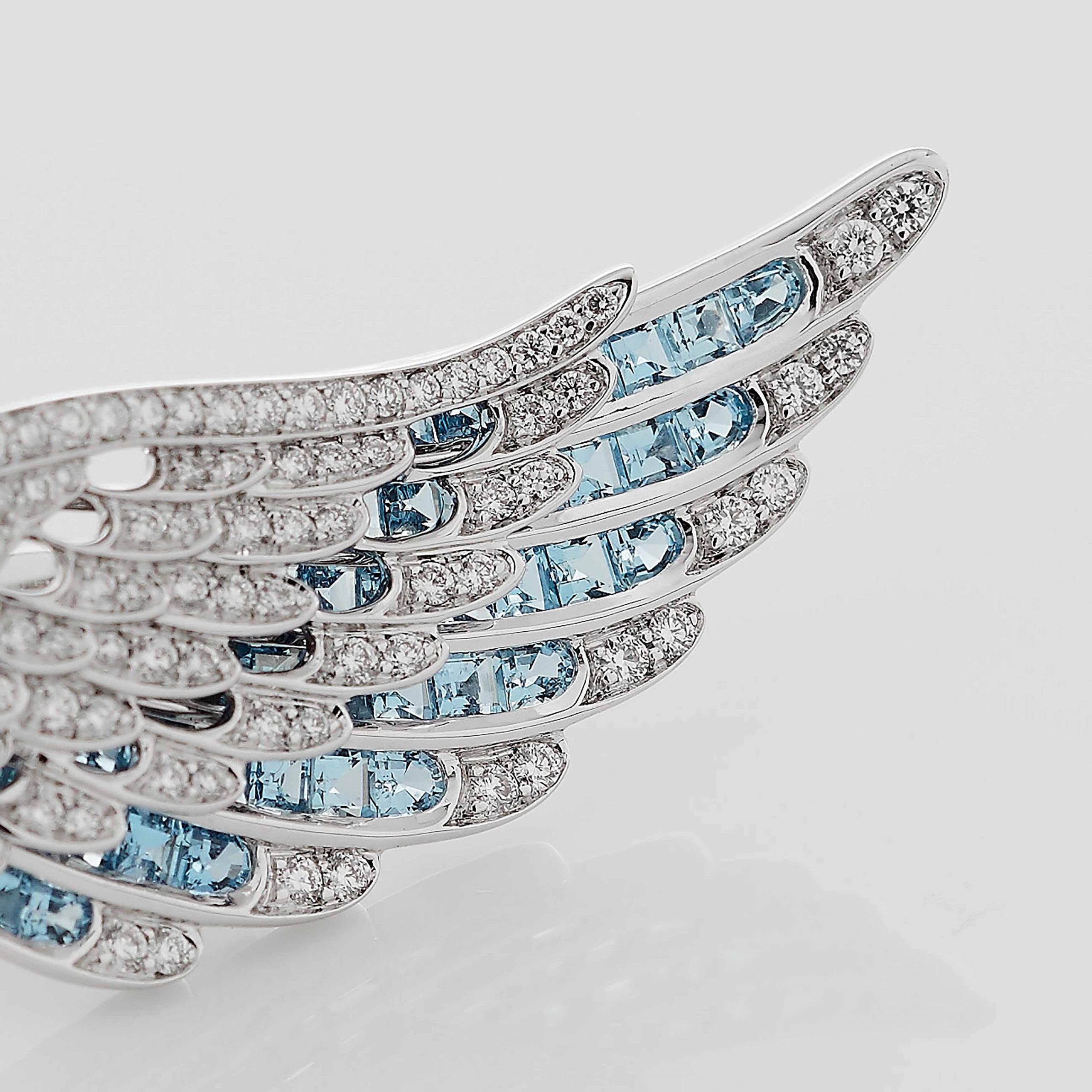 Garrard Wings Embrace jewellery collection Across the Finger Aquamarine and Diamond Ring In 18ct White Gold 2016579 Detail Garrard Wings Embrace jewellery collection Across the Finger Aquamarine and Diamond Ring In 18ct White Gold 2016579 Detail