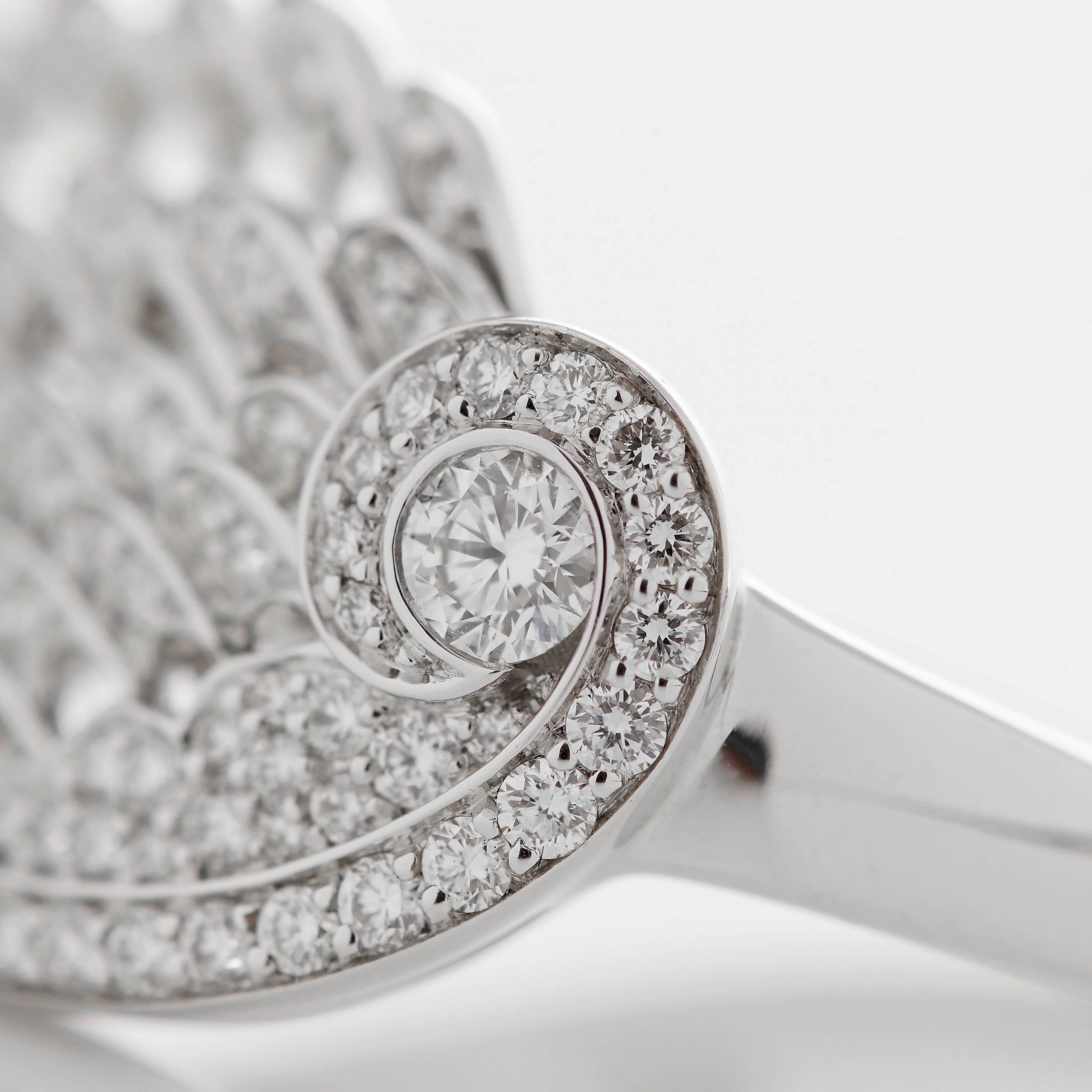 Garrard Wings Embrace jewellery collection Across the Finger Diamond Ring In 18ct White Gold 2016575 Detail View Garrard Wings Embrace jewellery collection Across the Finger Diamond Ring In 18ct White Gold 2016575 Detail View