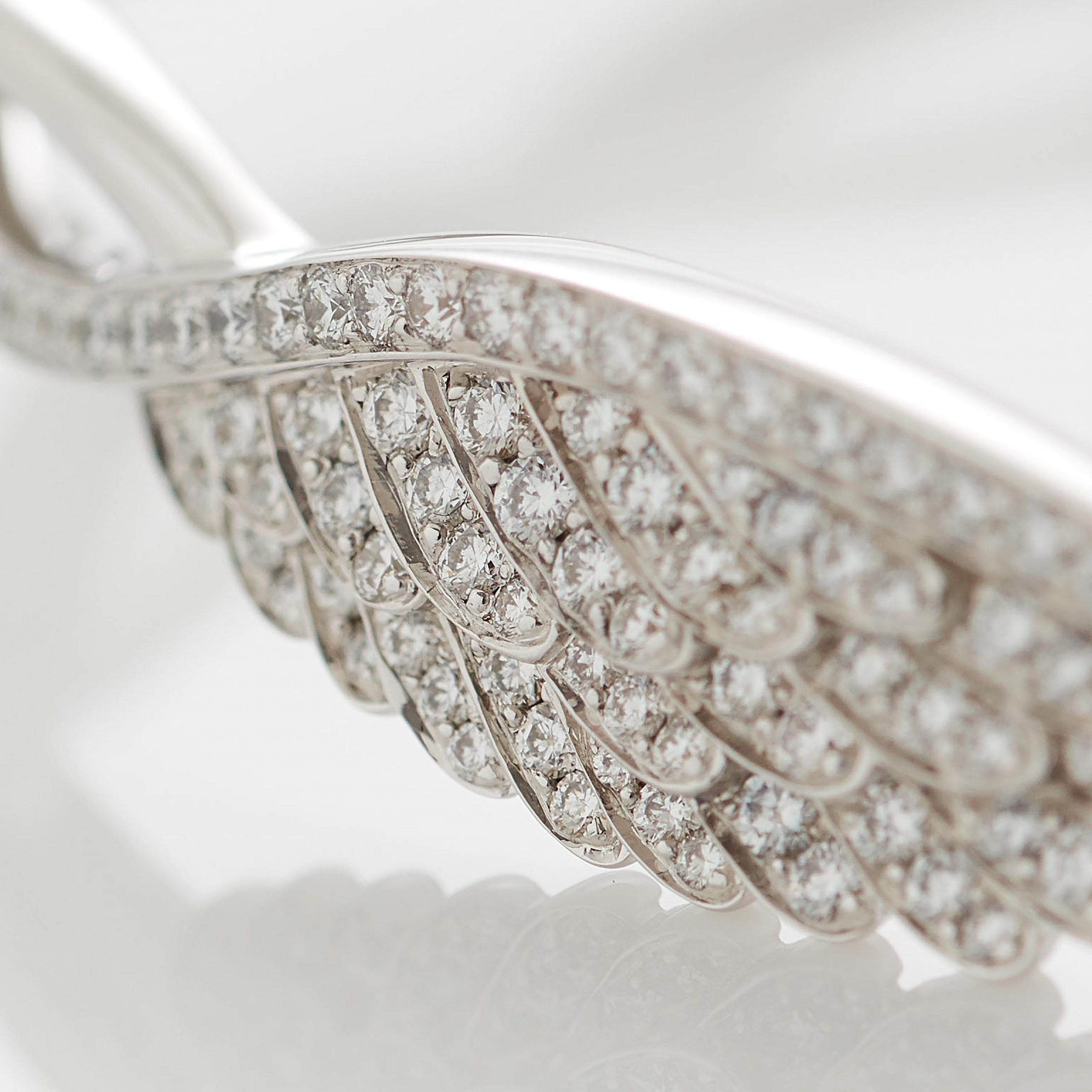 Garrard Wings Embrace jewellery collection Diamond bangle in 18ct white gold 2015922 2015754 2015923 Detail View Garrard Wings Embrace jewellery collection Diamond bangle in 18ct white gold 2015922 2015754 2015923 Detail View