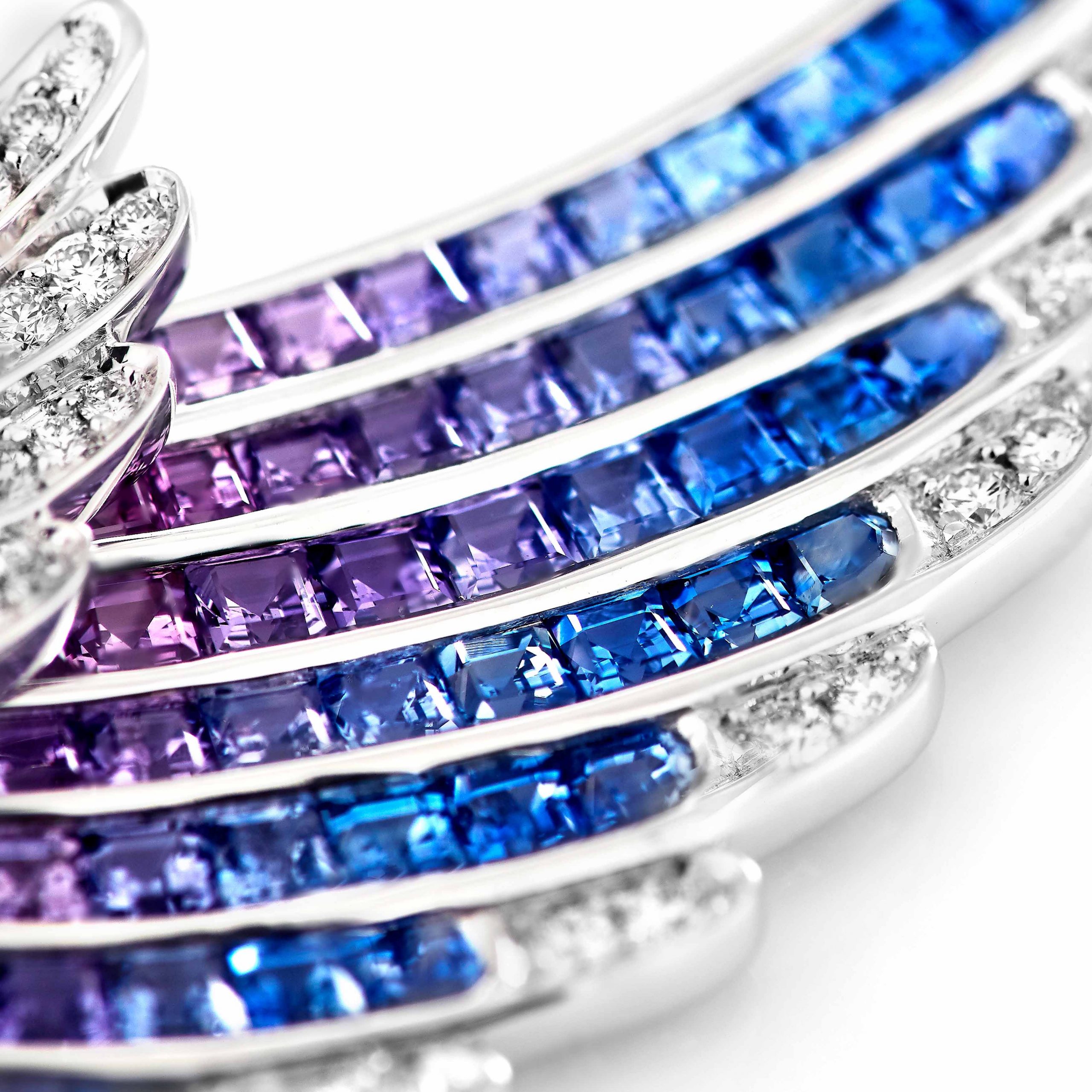 Garrard Wings collection Embrace Bird of Paradise Slider Pendant In 18ct White Gold with Diamonds and Sapphires 2017913 Detail Garrard Wings collection Embrace Bird of Paradise Slider Pendant In 18ct White Gold with Diamonds and Sapphires 2017913 Detail