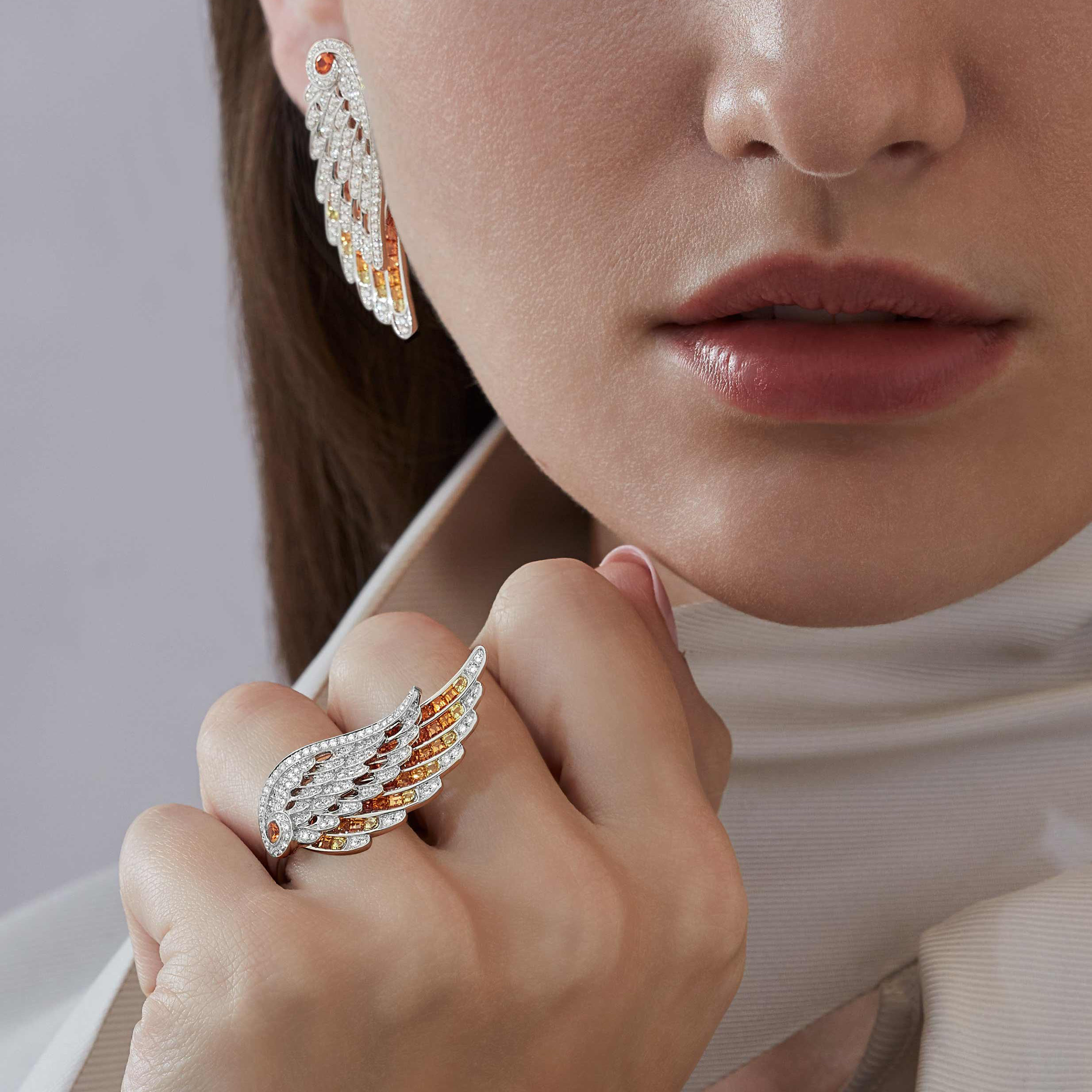 Garrards Wings Embrace jewellery collection Phoenix Ring in 18ct White Gold with DIamonds and Sapphires 2017609 On Model 1 Garrards Wings Embrace jewellery collection Phoenix Ring in 18ct White Gold with DIamonds and Sapphires 2017609 On Model 1