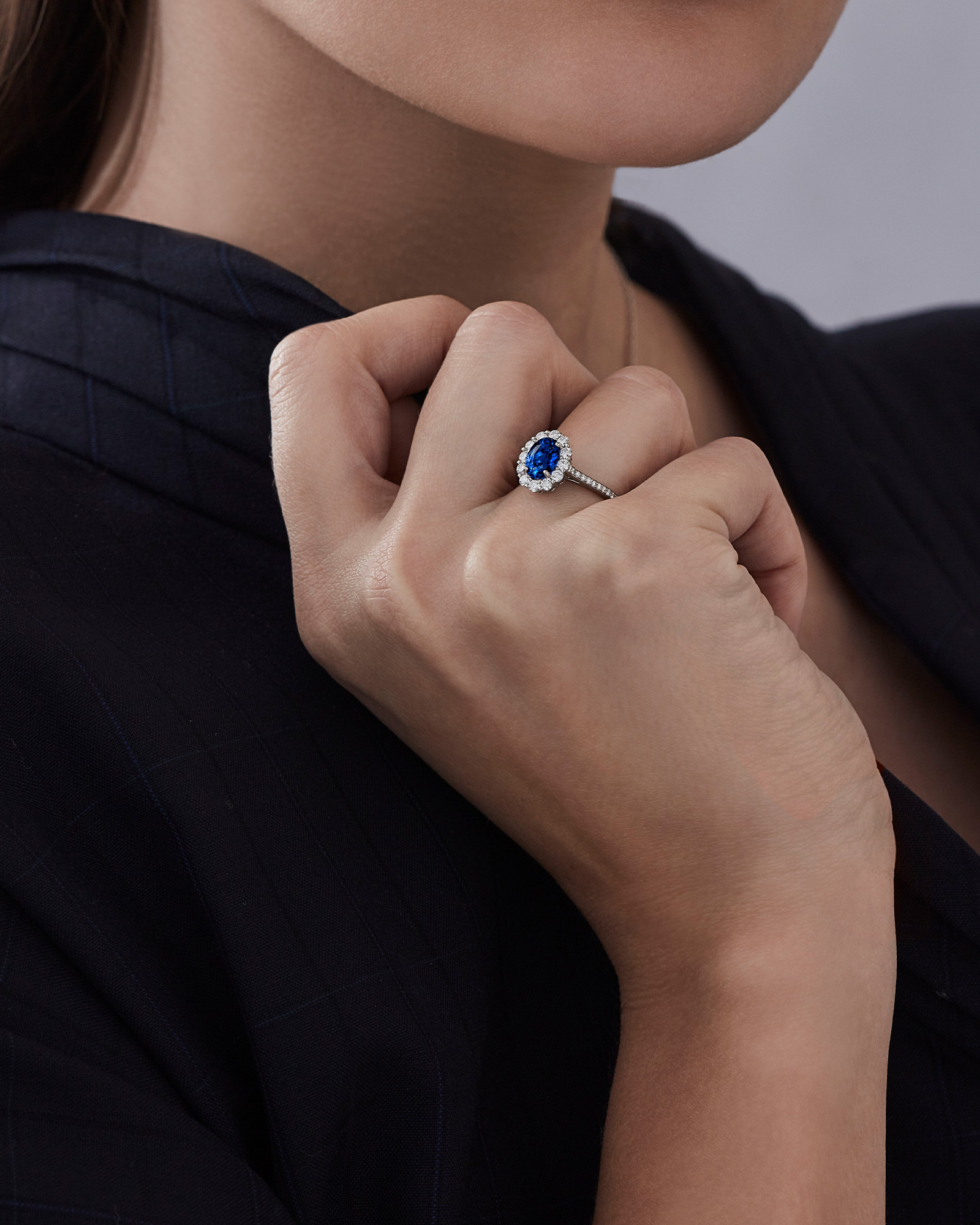 Model wears Garrard 1735 jewellery collection sapphire and diamond ring