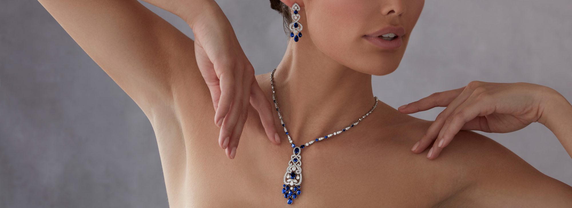 Model wears Garrard high jewellery collection Regal Cascade High Jewellery Suite desktop