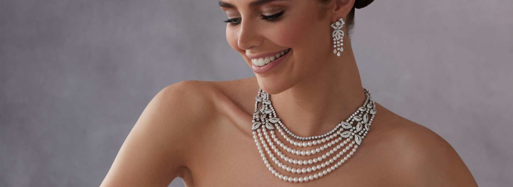 Model wears Garrard high jewellery collection Rose Garden High Jewellery Suite desktop 1