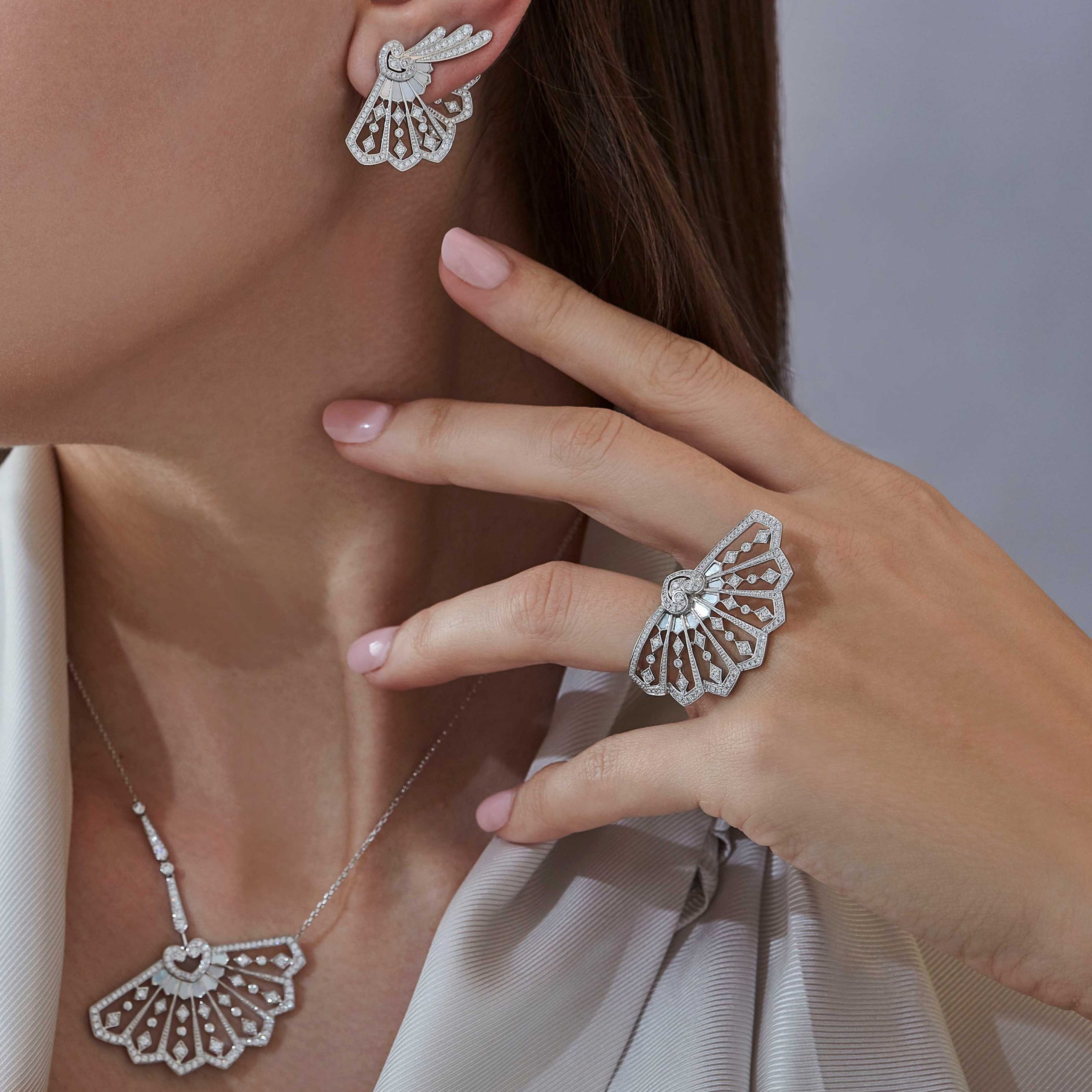 Garrard Fanfare Classic jewellery collection white diamond and mother of pearl ring in 18ct white gold 2015313 On Model scaled 1