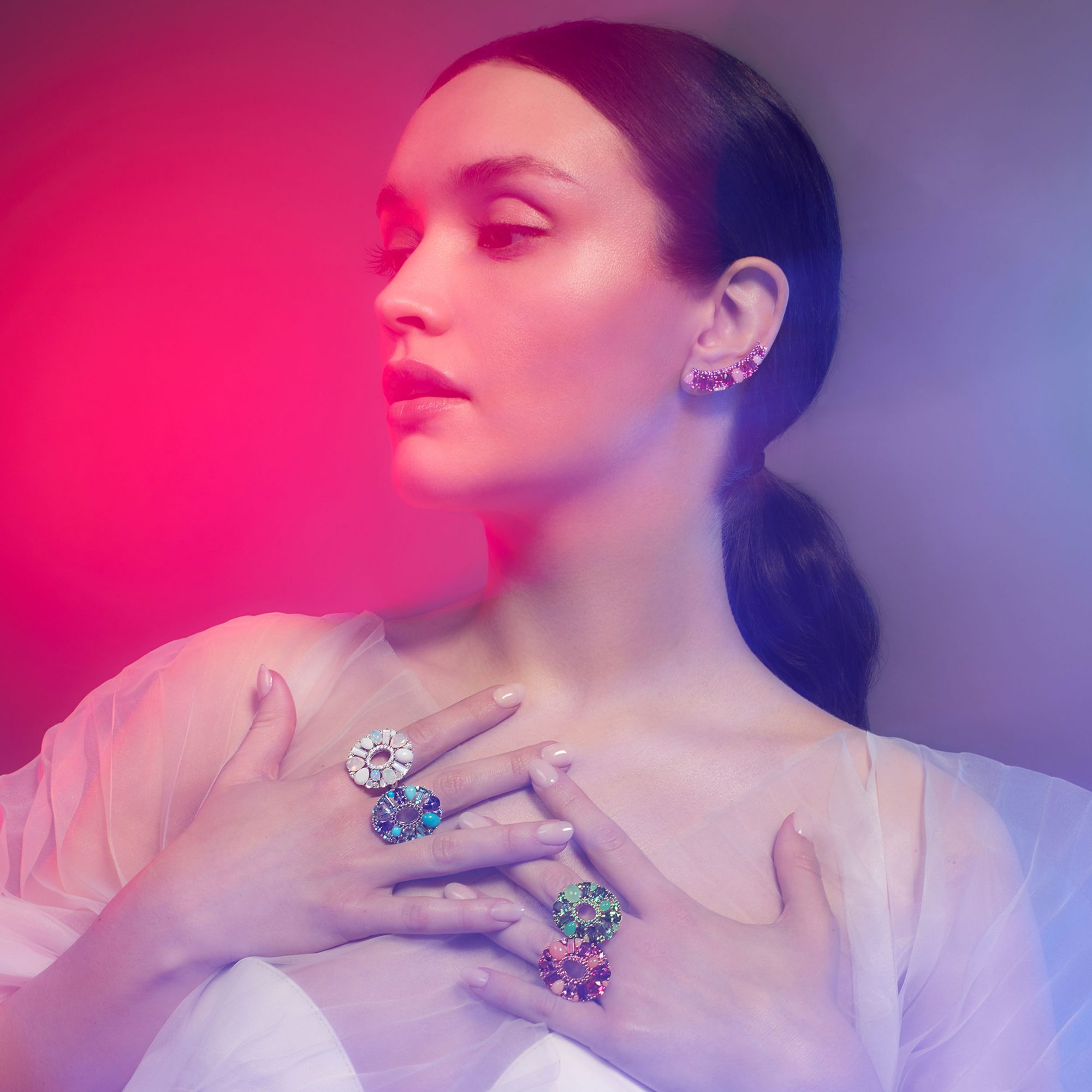 Garrard Brand Ambassador Olivia Cooke wears Blaze jewellery collection multicolour earrings and ring