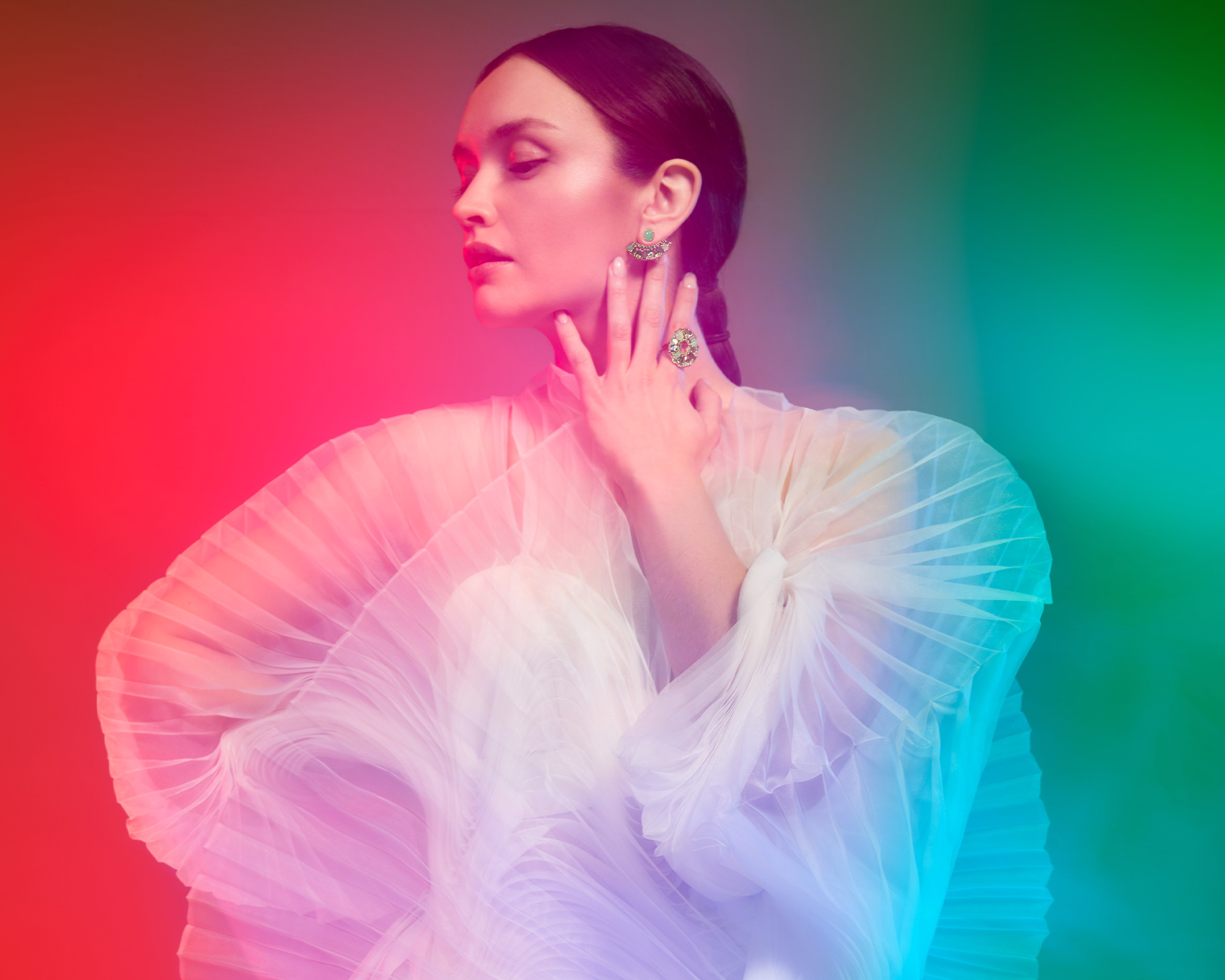 Garrard Brand Ambassador Olivia Cooke wears Blaze jewellery collection green earrings and ring feature 2