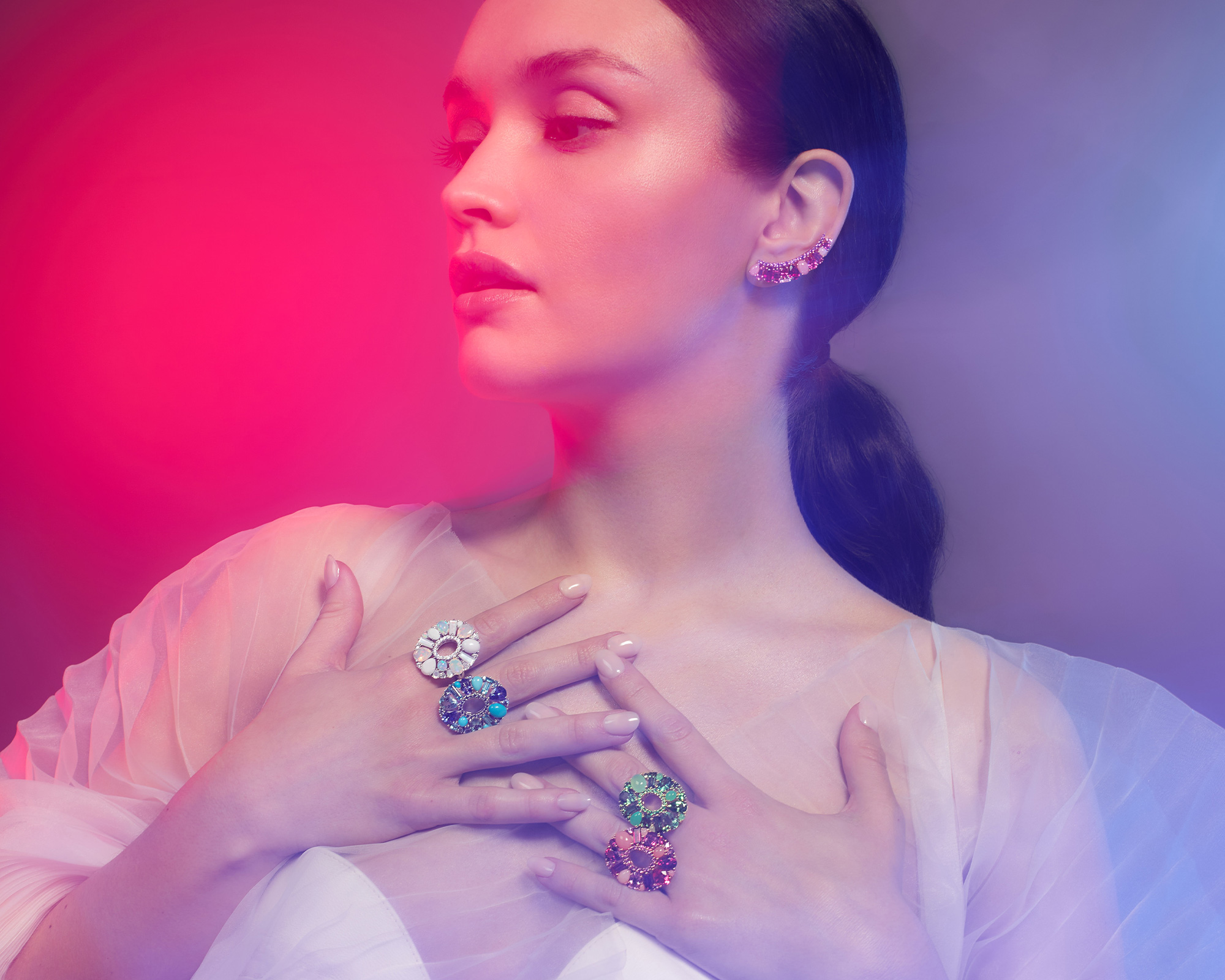 Garrard Brand Ambassador Olivia Cooke wears Blaze jewellery collection multicolour earrings and ring feature